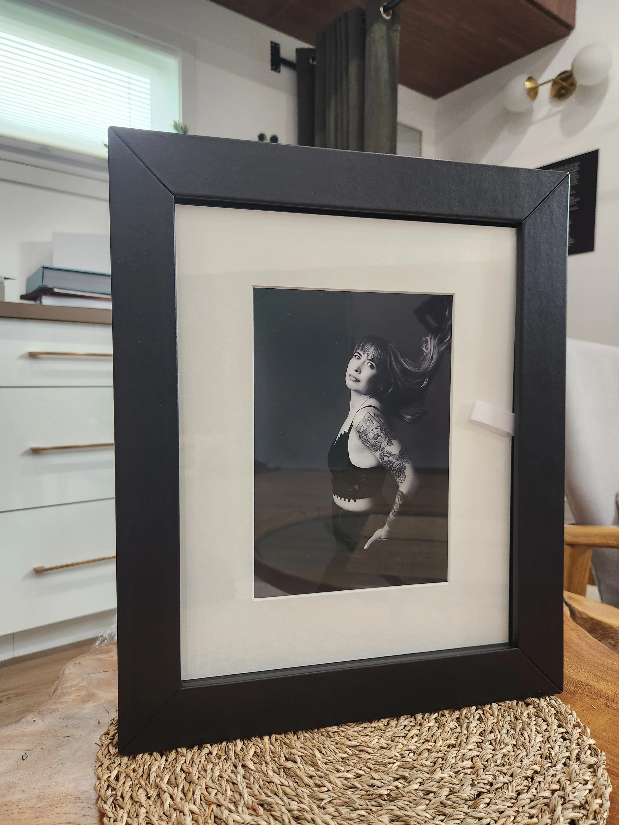 Custom folio box with matted fine art portrait prints from Cedna Portrait Stories Calgary portrait studio