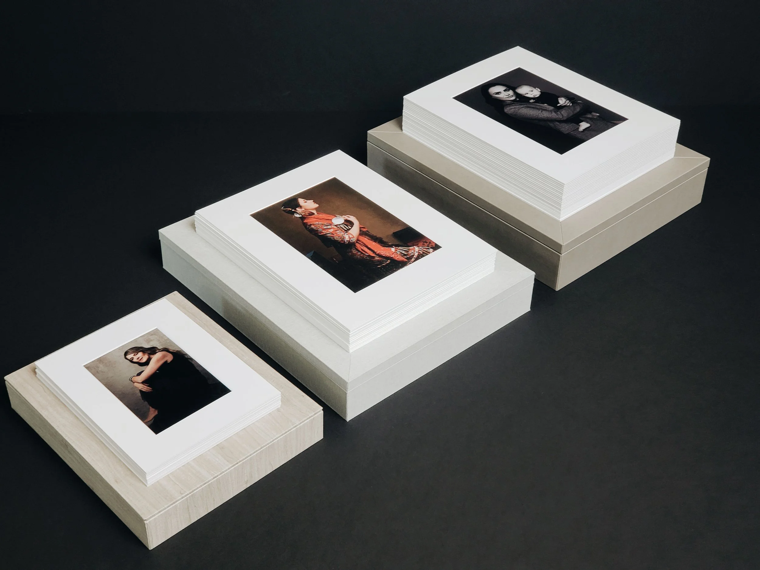 Fine art matted prints and folio boxes for personal and family portraits in Calgary, Alberta