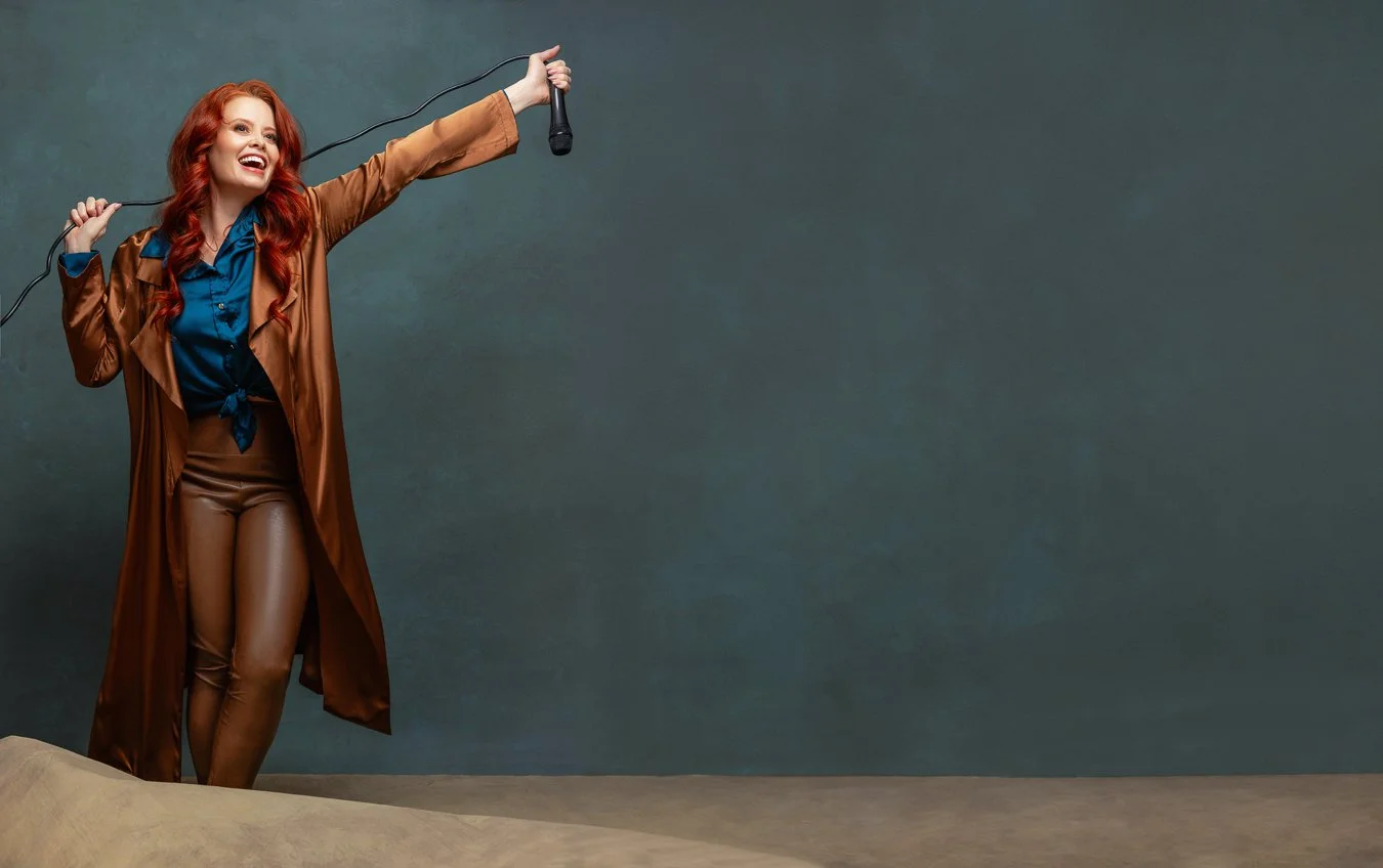 Personal branding photo of a beautiful redhead woman