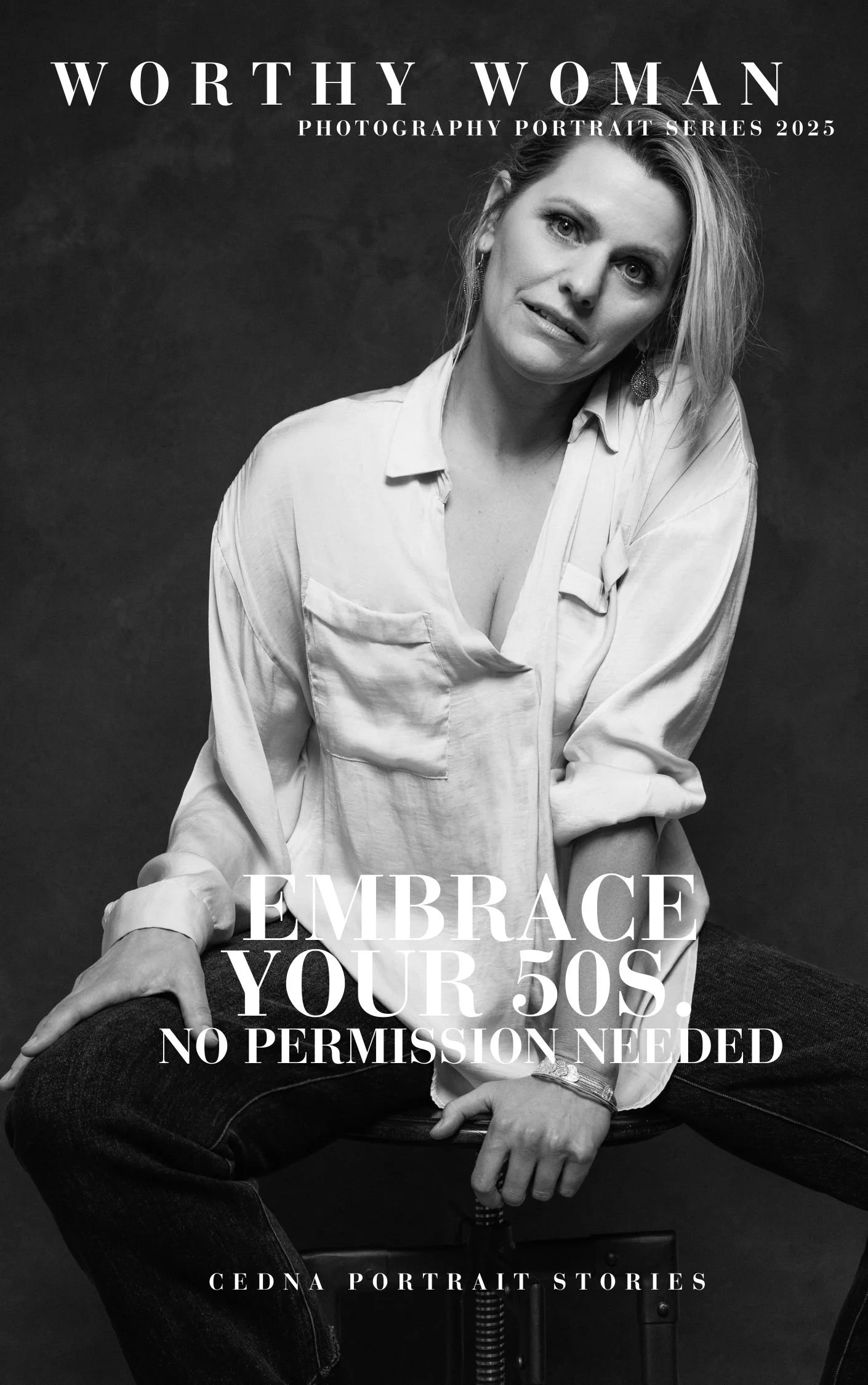 Fine art portrait of a woman in her 50s celebrating personal strength and resilience.
