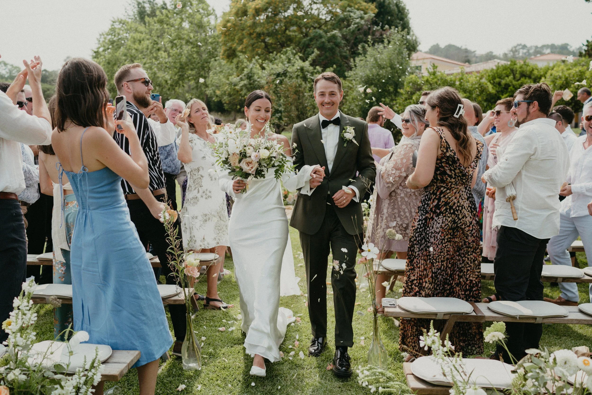 bride and groom walking back down the aisle after outdoor ceremony at Quinta de Sant'Ana Mafra Portugal