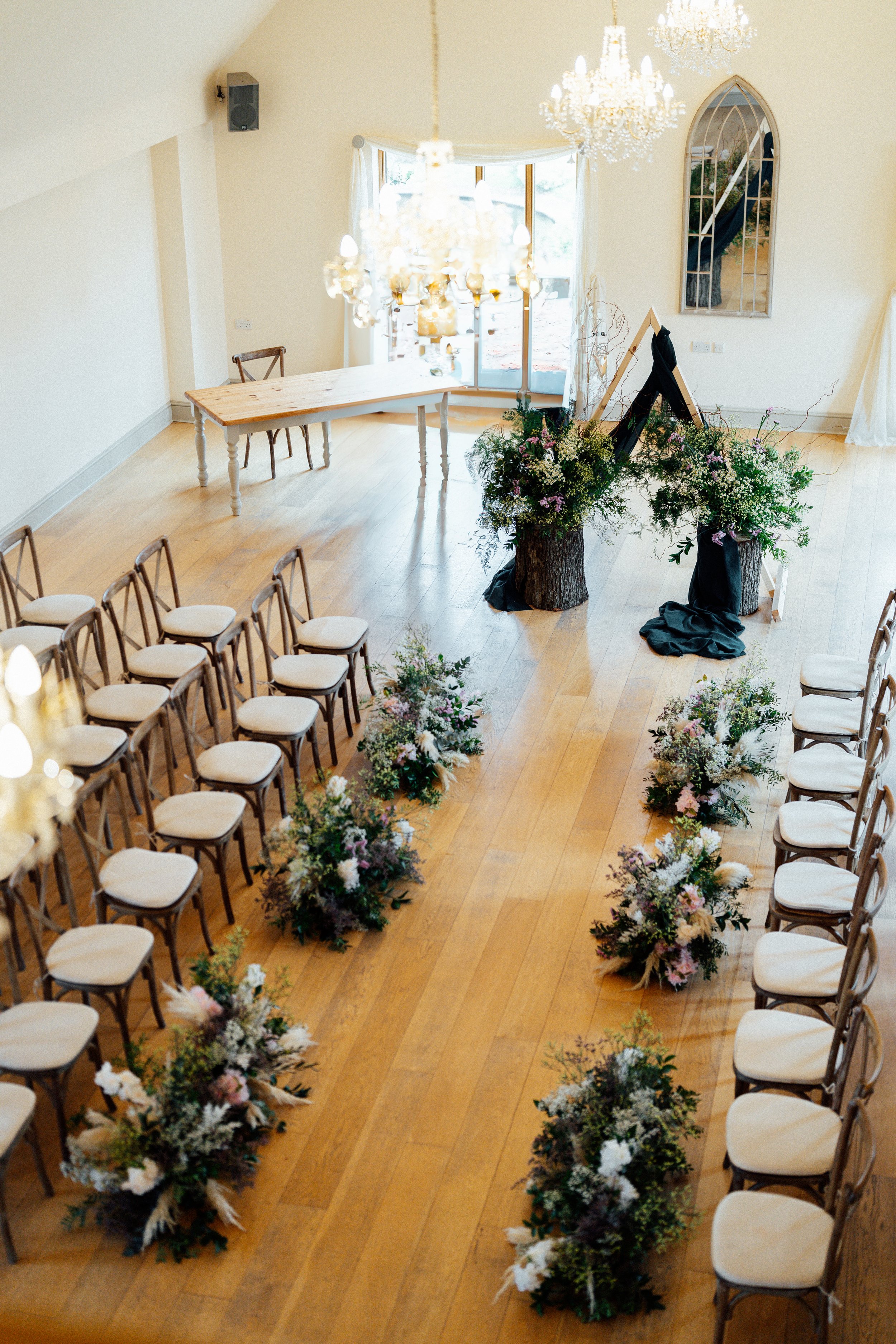 Rows of tables decorated ready for a wedding breakfast