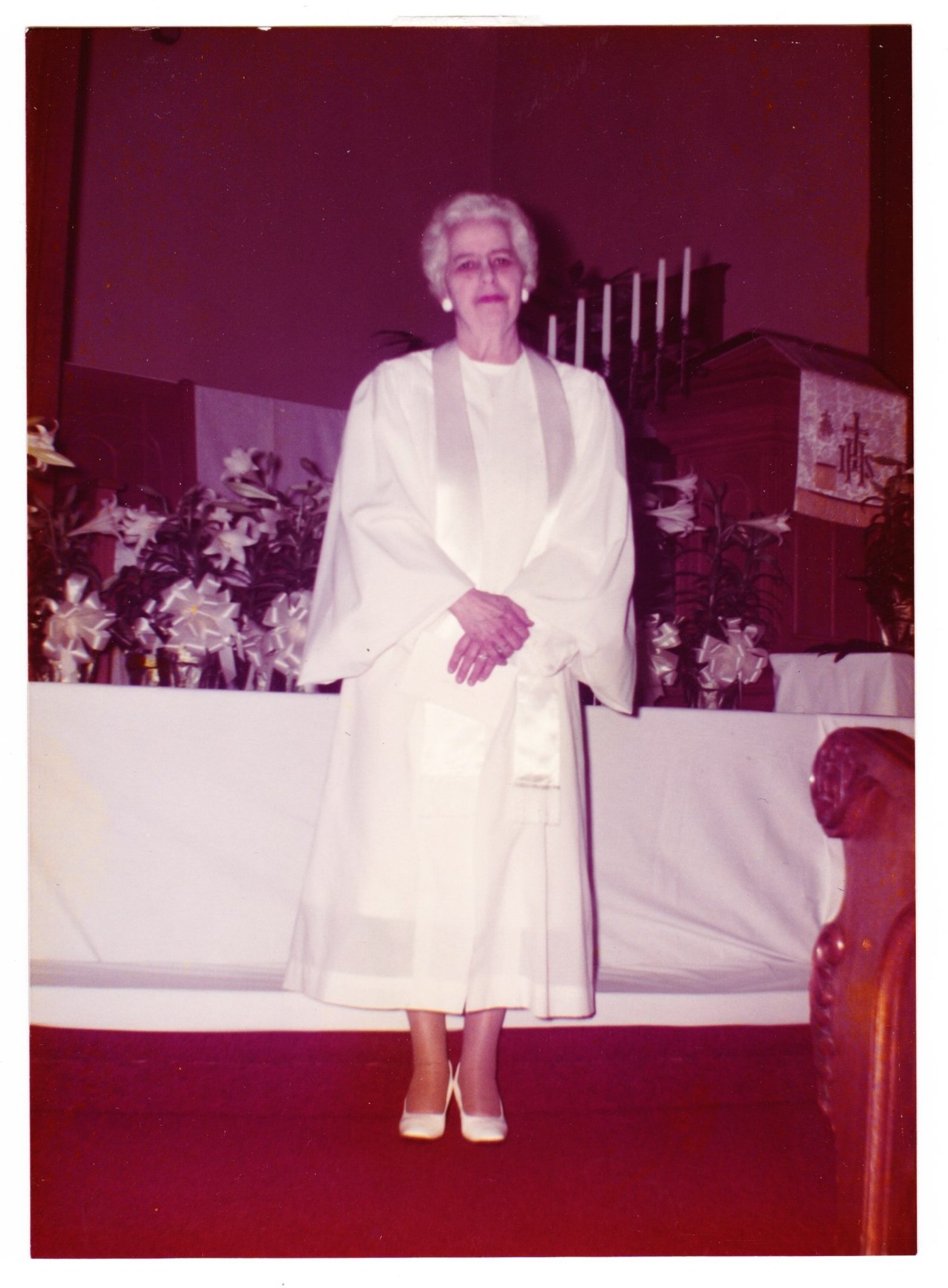 Lillian Russell in white robe on Easter Sunday.