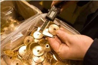 photo of caliper measuring gears