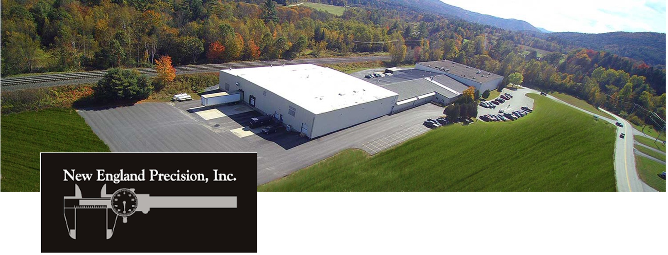 New England Precision logo and facilities photo