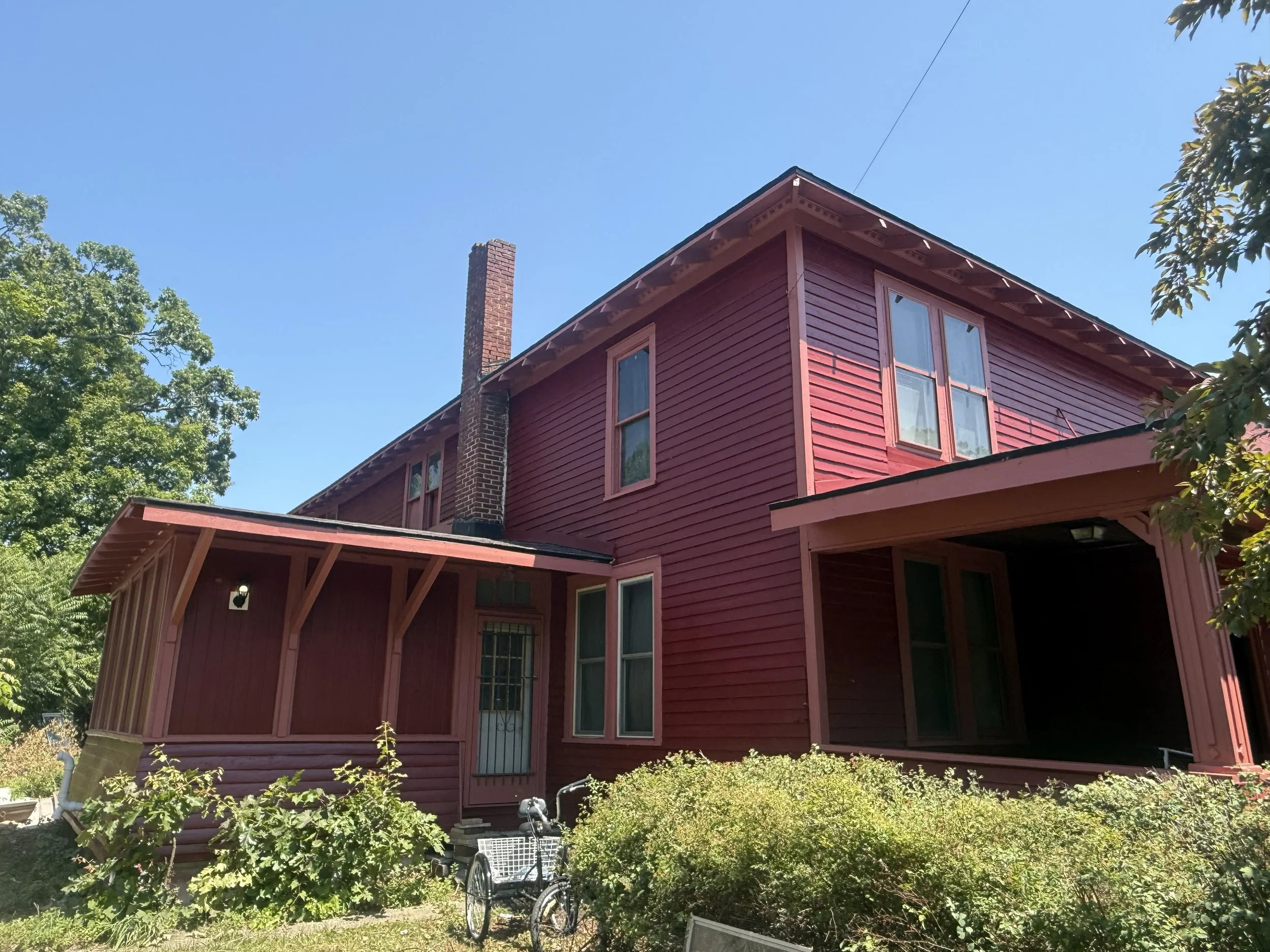 red exterior paint job on house