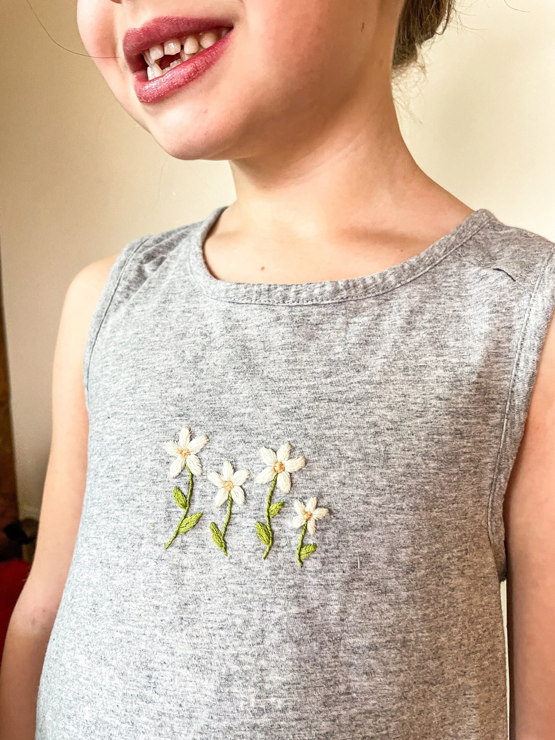 Hand embroidered shirt with white daisies