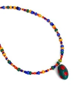 close up polymer clay egg necklce.jpg