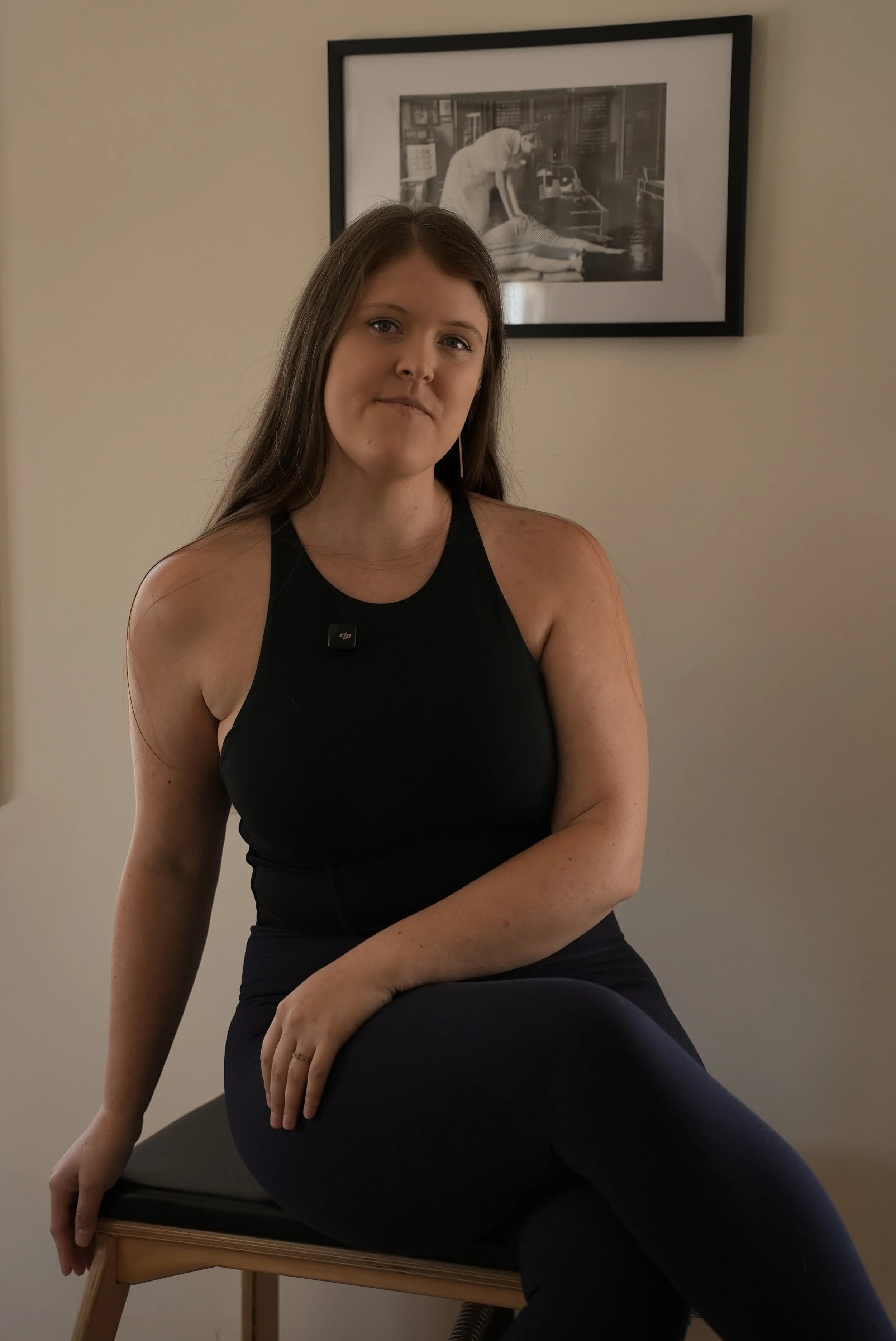 Faith Coben, owner of Backcountry Pilates in Seattle, on a Pilates chair
