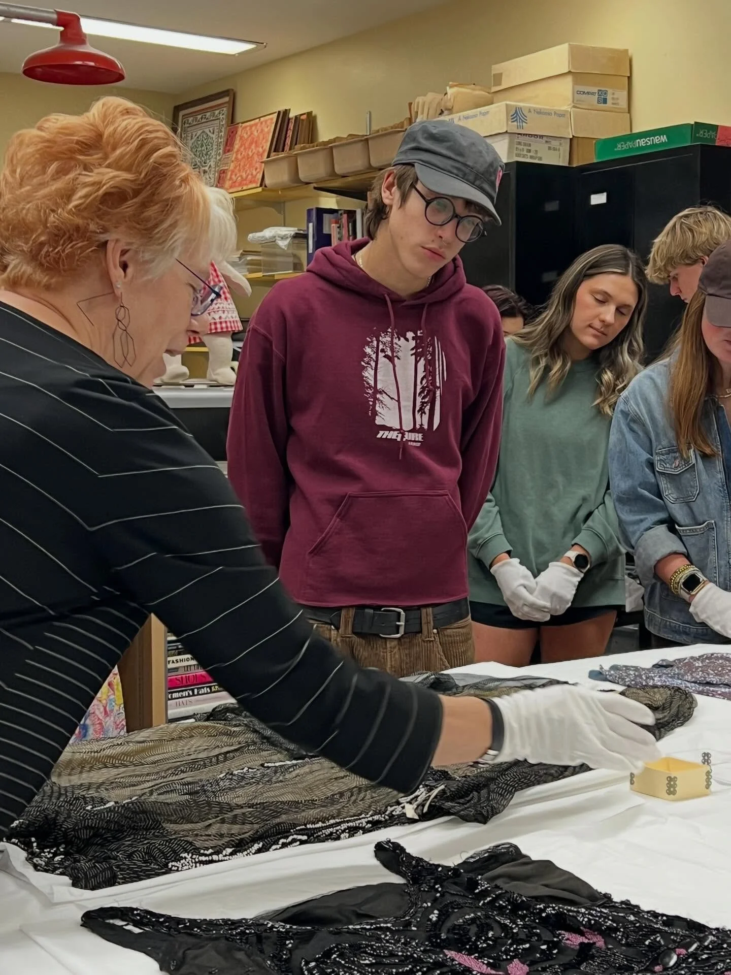 We are so grateful to the Kansas State Historic Costume and Textile Museum and Marla Day for providing hands on learning opportunities for our Fashion History class this semester. Our students find so much value in interacting with and learning about