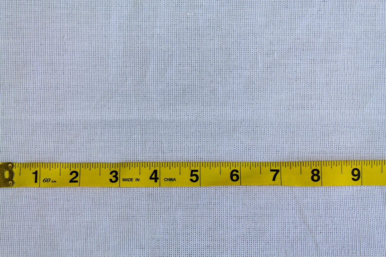 cotton fabric with tape measure.jpg