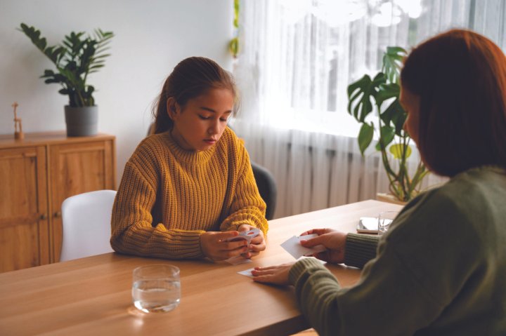 How should parents talk to children about infidelity without causing emotional harm?