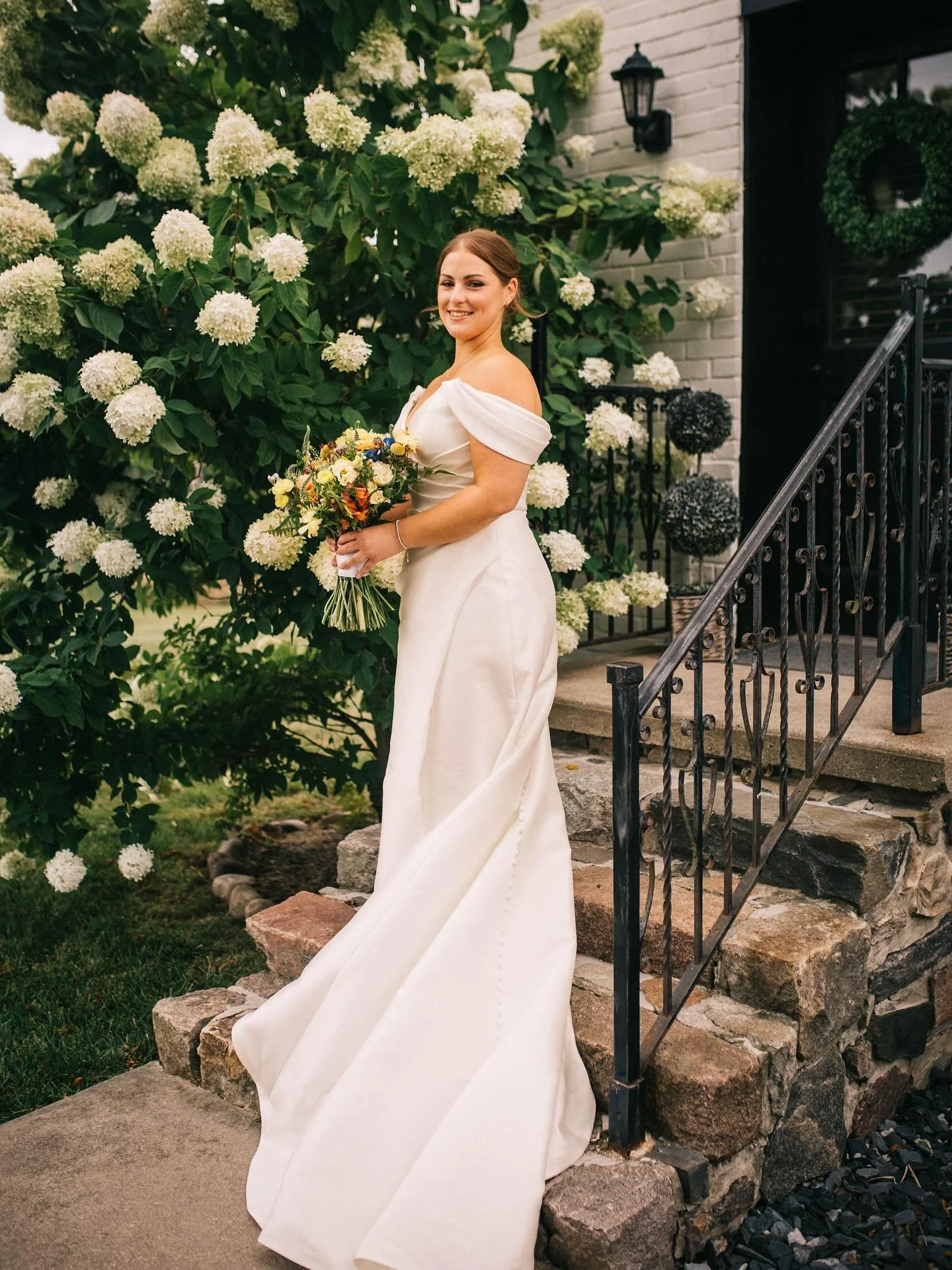 The Post Office is one of our favorite photo locations&mdash; the beautiful hydrangeas and white, bright backdrop allows our brides to shine. Is she not just a vision? 🥹🤍