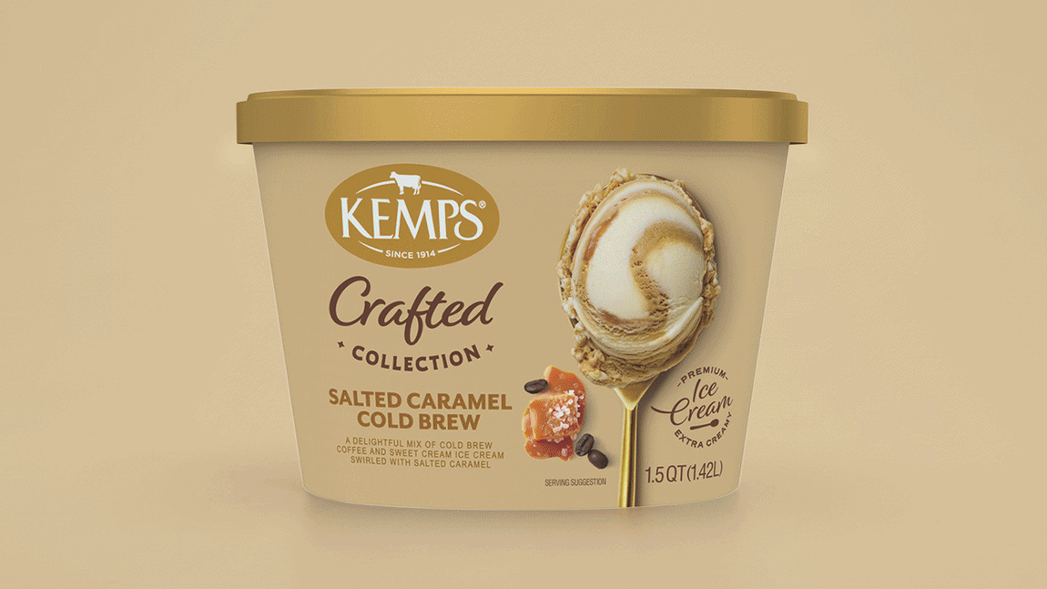 A tub of Kemp's Crafted Collection Salted Caramel Cold Brew ice cream with salt caramel pieces and coffee beans on the label.