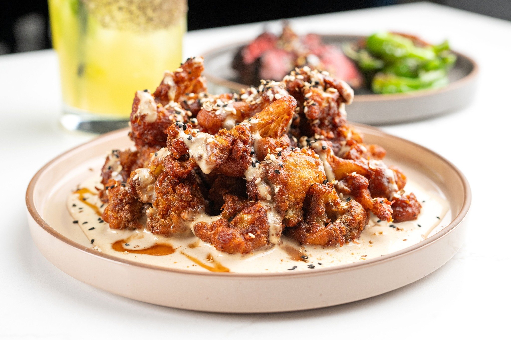 cauliflower that's crave-worthy ✨ a mezze dish to share over happy hour or dinner, come discover how we turn veggies into must-haves. dinner reservations available through the bio link.

fried cauliflower &middot; tahini &middot; aleppo honey &middot