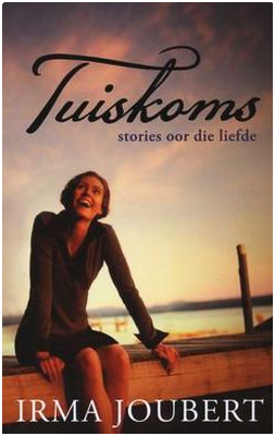Book cover titled 'Tuisloms: stories oor die liefde' by Irma Joubert, featuring a smiling woman sitting outdoors by a body of water during sunset.