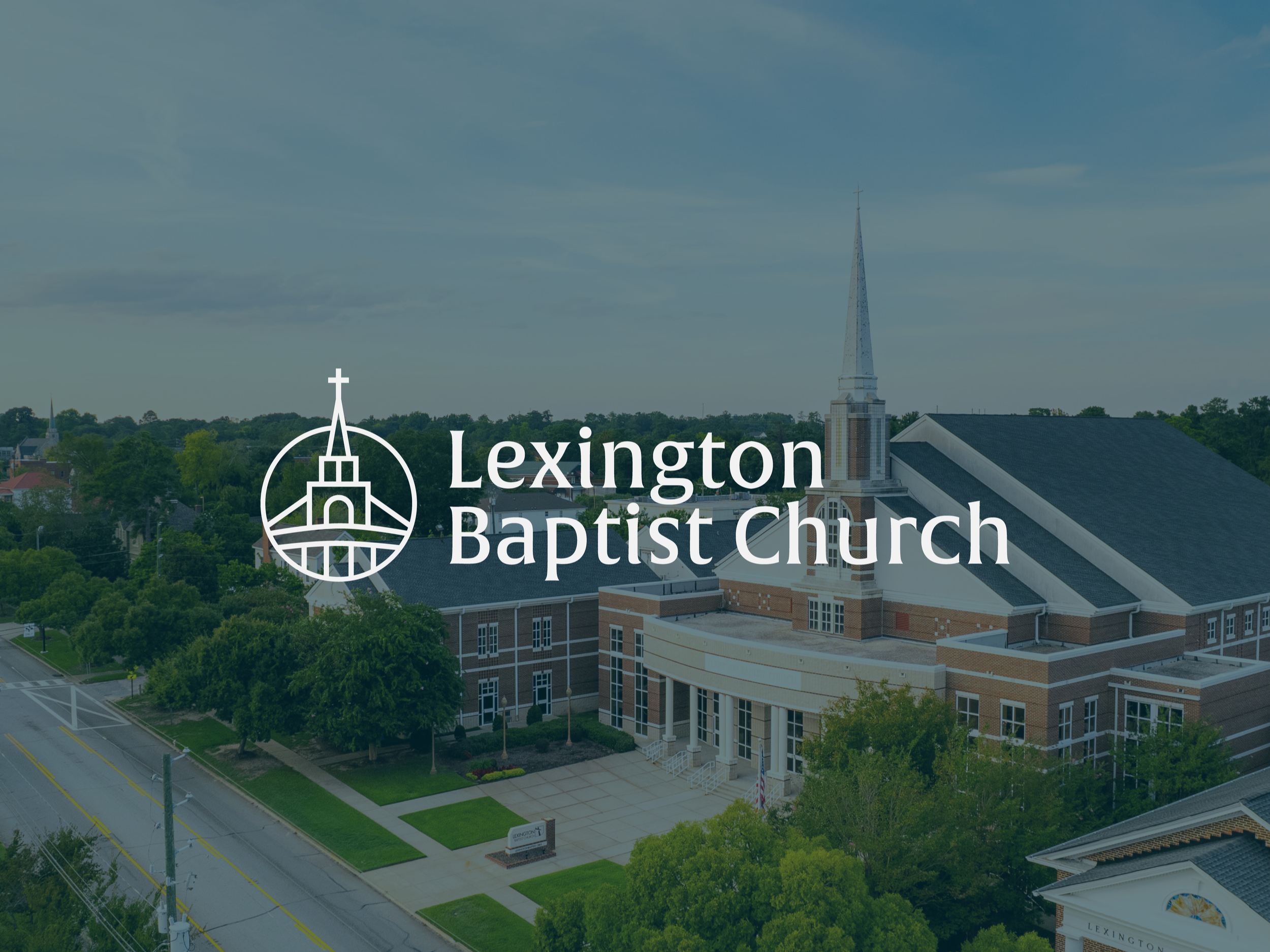 baptist church white logo overlay building