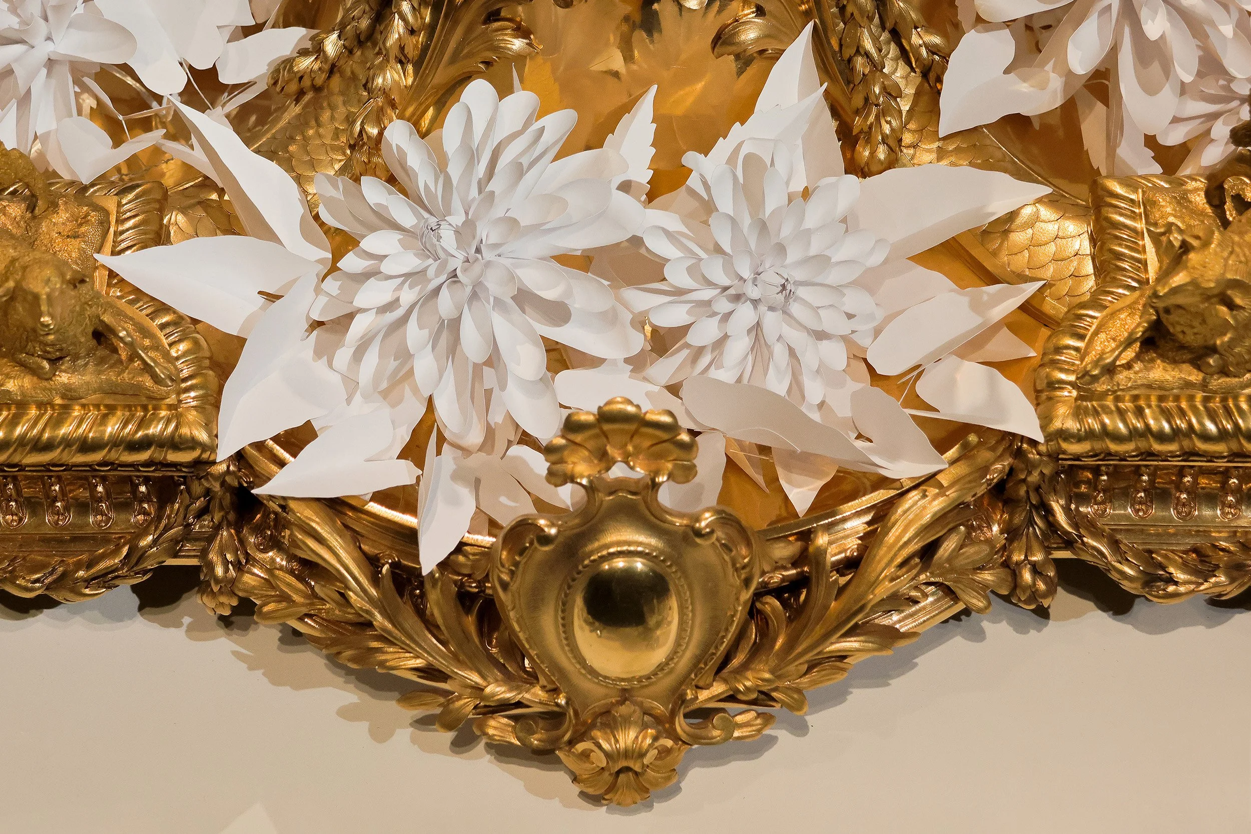 White paper dahlias arranged inside an ornate gilded Christofle jardinière, Musée des Arts Décoratifs, Paris.
