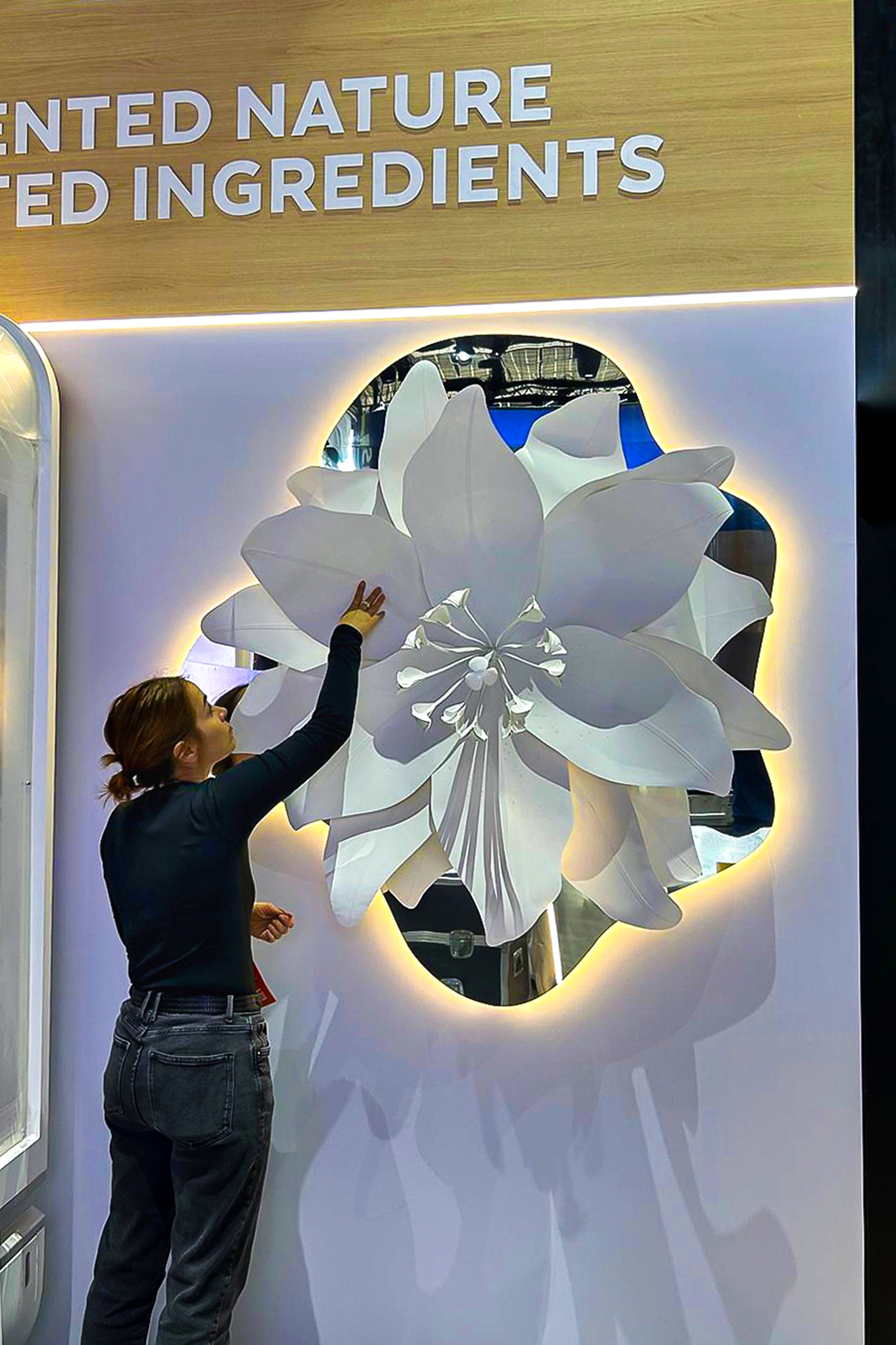 Final adjustments to the botanical paper installation before the opening of Vivatech by Léa Dubreuil.
