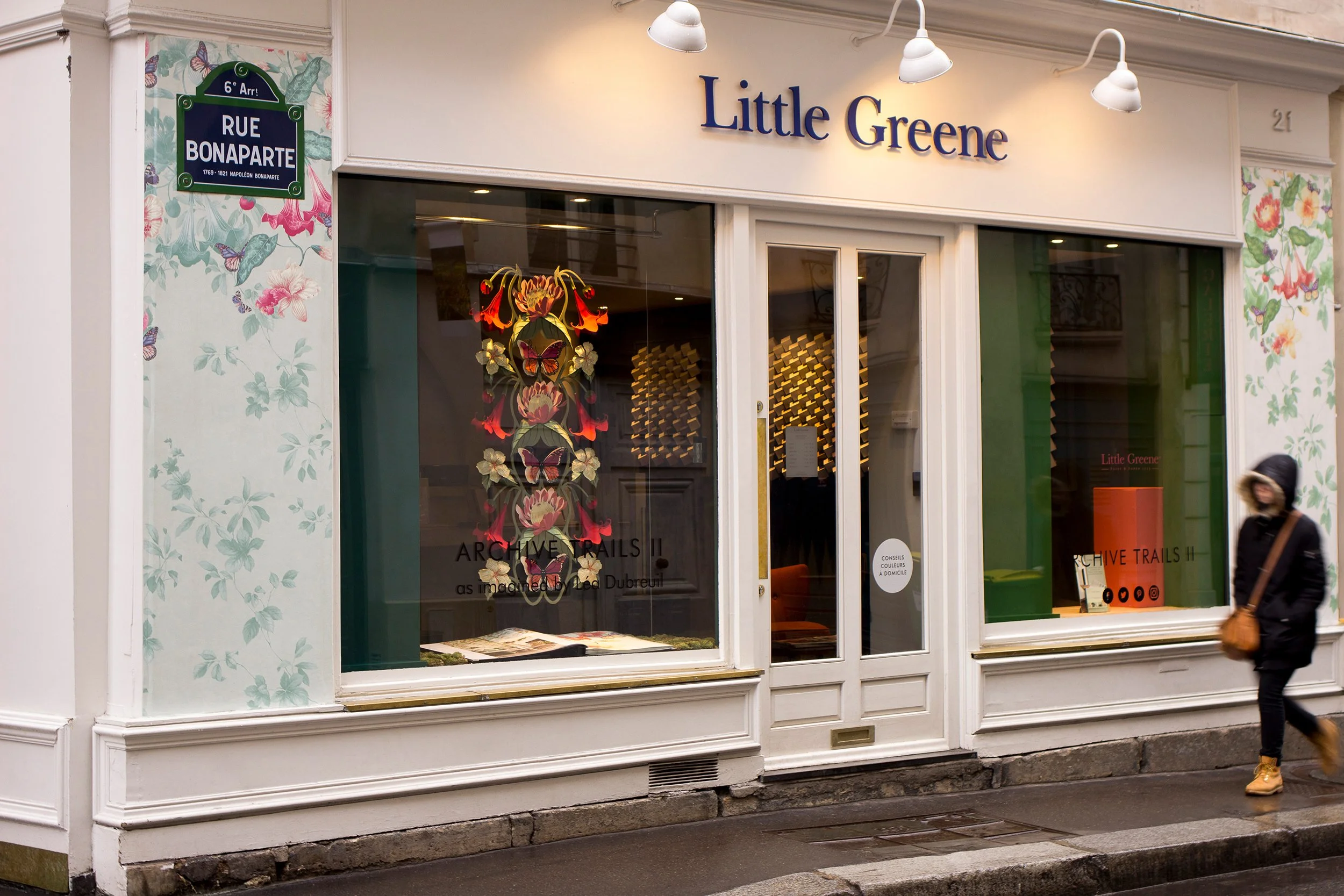Little Greene Paris showroom window display featuring a handcrafted paper installation inspired by the Asterid wallpaper pattern