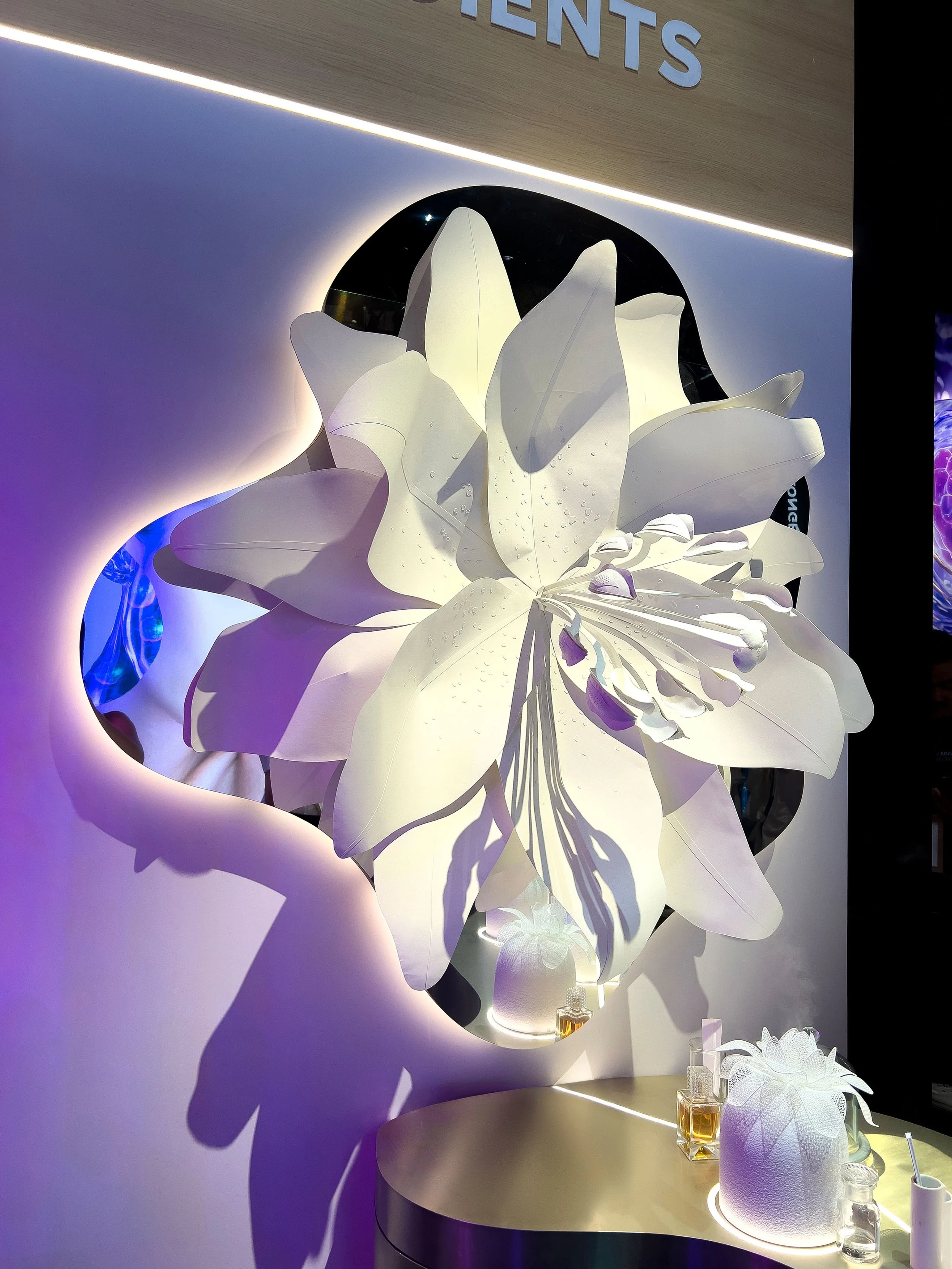 Large botanical paper installation inspired by augmented nature, created for L'Oréal Group at Vivatech Paris.