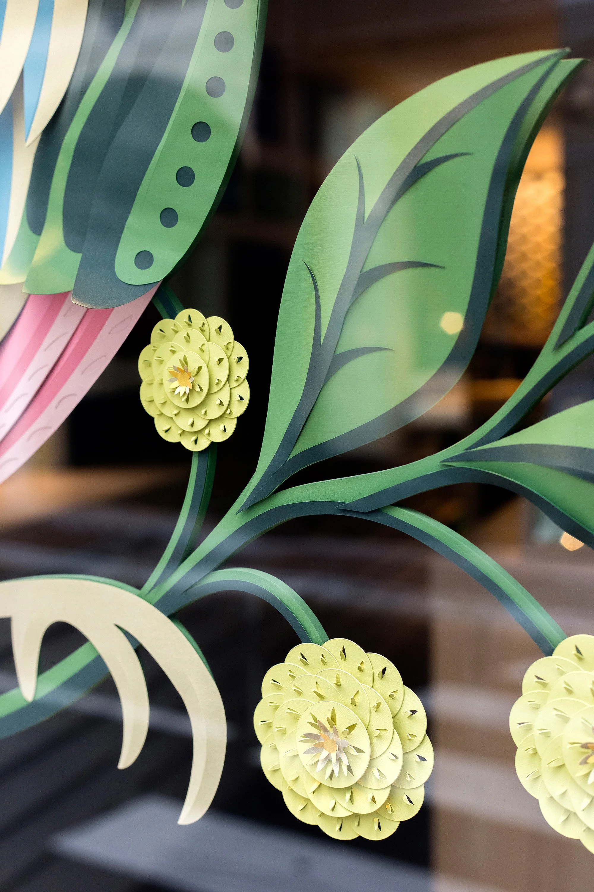 Paper botanical detail with layered flowers, Bird of Paradise installation