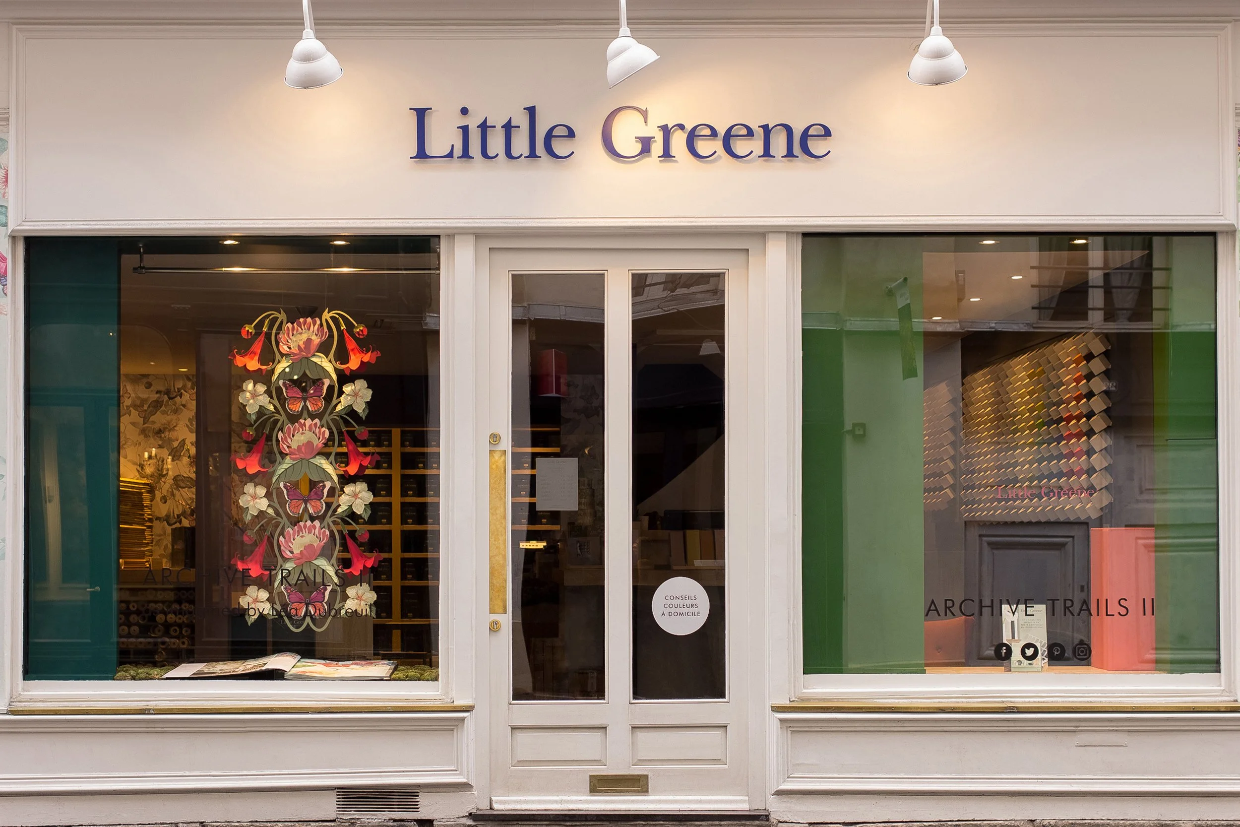 Hand-painted paper retail installation inspired by the Asterid wallpaper pattern in the Little Greene Paris showroom