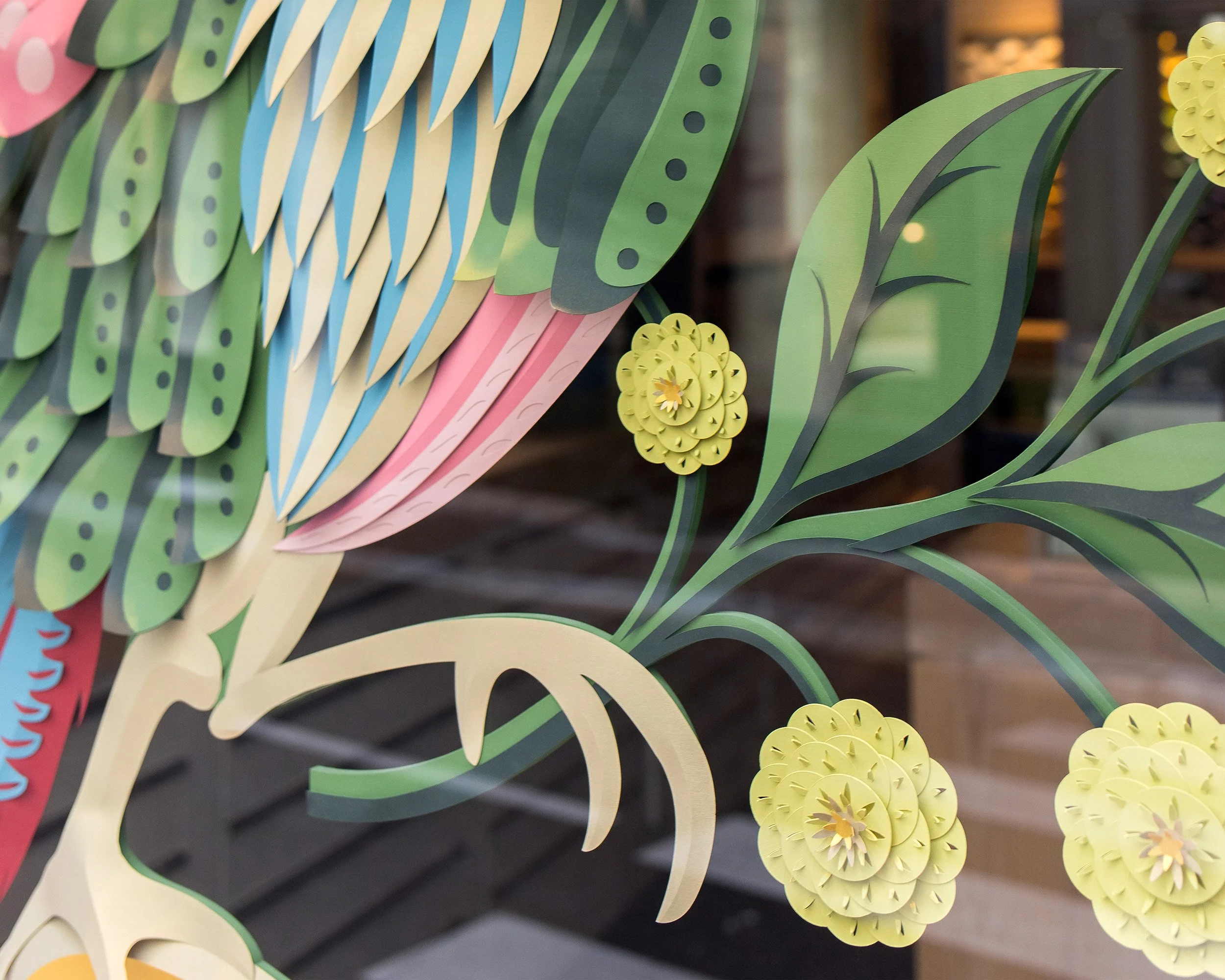Detail of layered paper leaves and flowers, Bird of Paradise installation