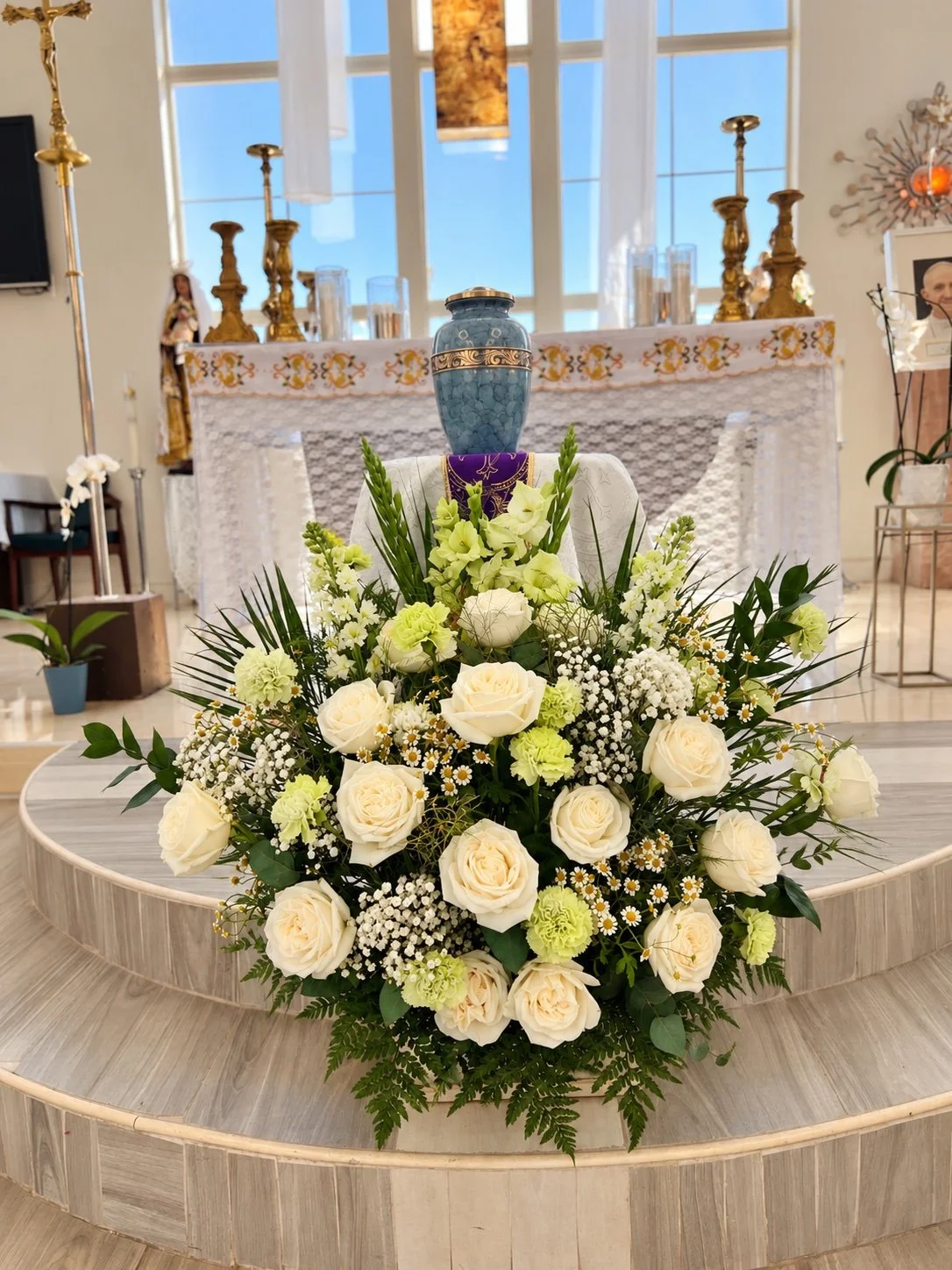 Serene White Floral Church Altar.jpg