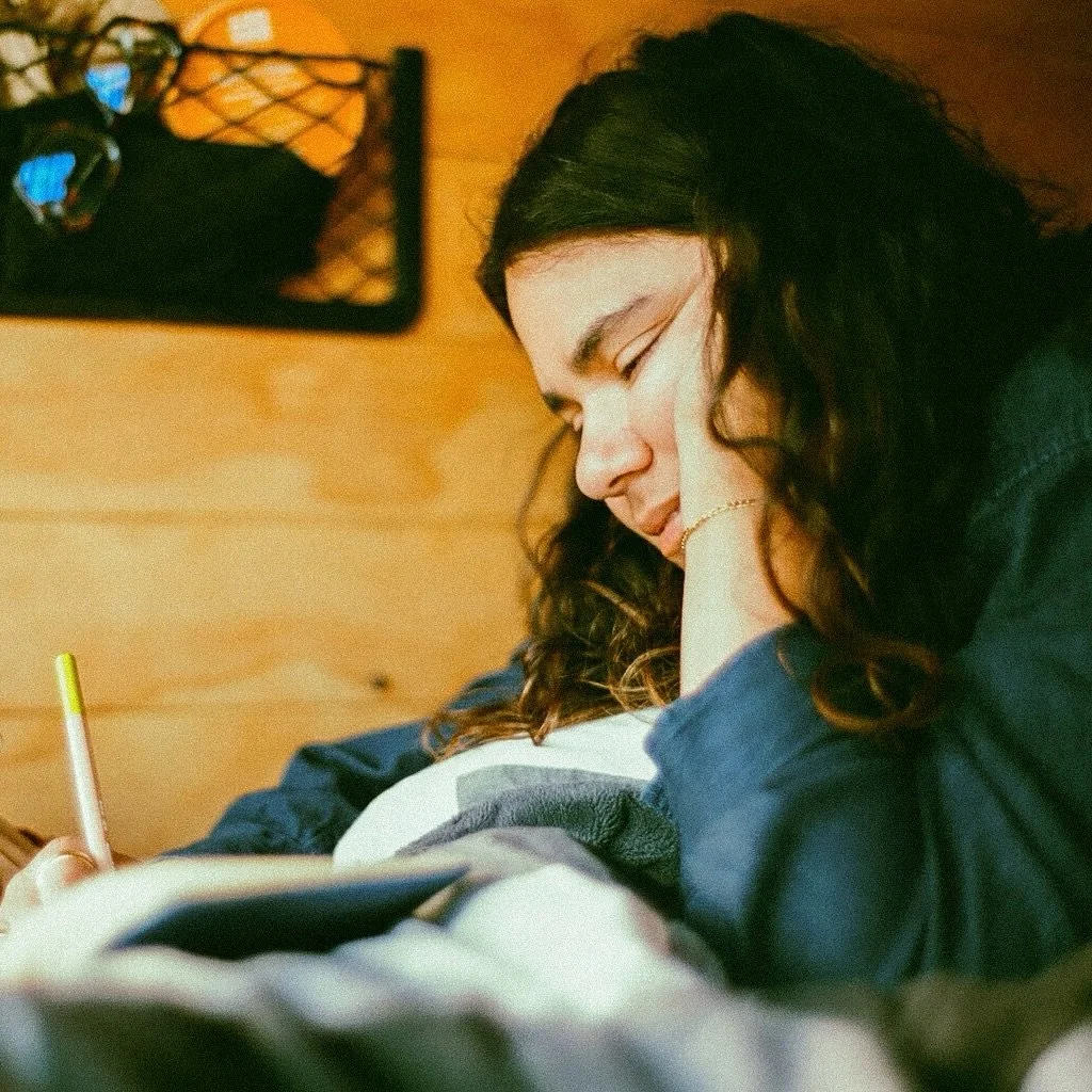 chubby cheeks ✔️
sketchbook ✔️
nature ✔️
knotted hair ✔️ 

shot by my love @clayton_gilligan 🎞️🫶🏽