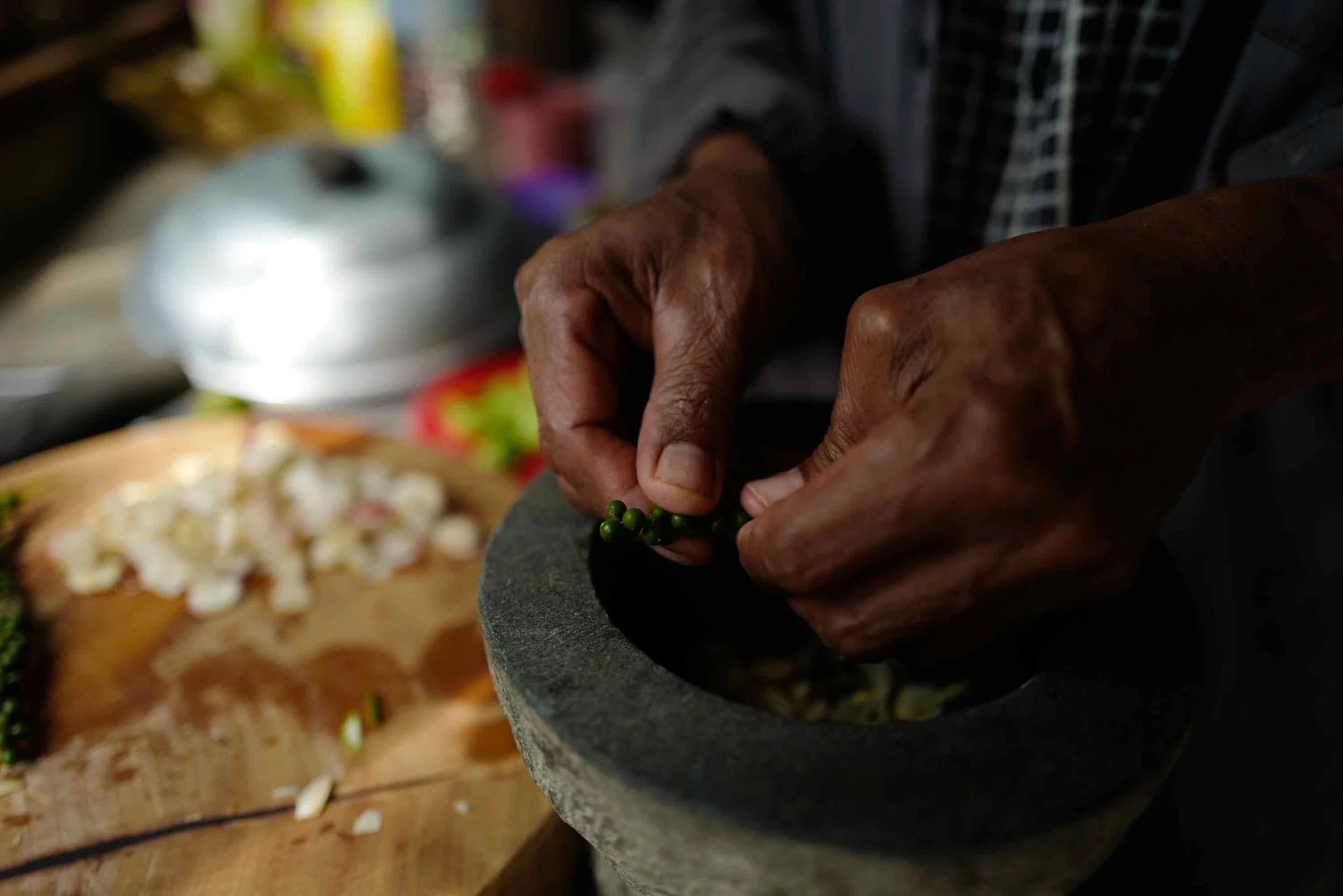 Amy’s father is making a southern curry paste using fresh ingredients directly from the home garden.
