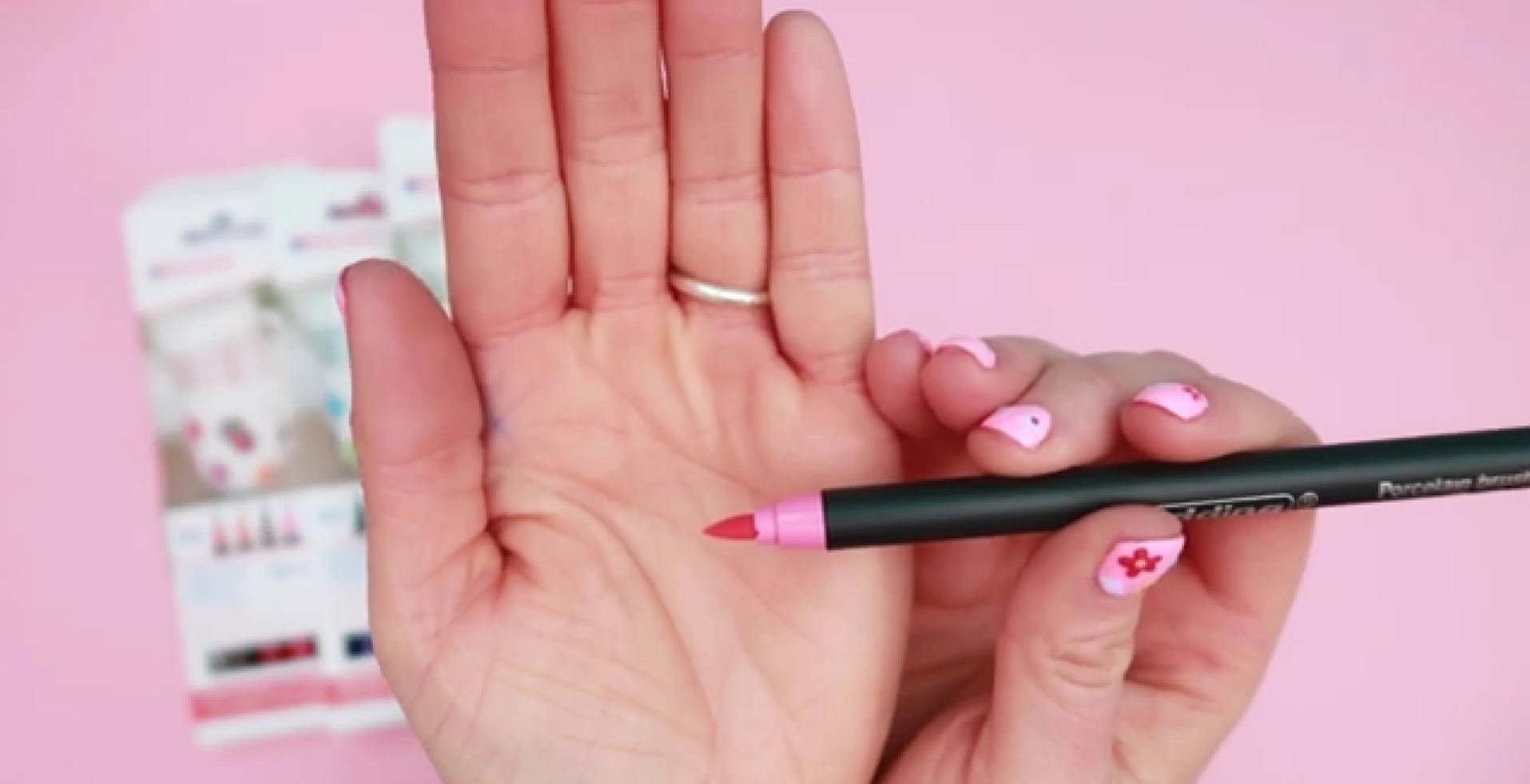 Close-up of porcelain brush pen tip showing firm flexible nib for controlled painting on ceramic surfaces