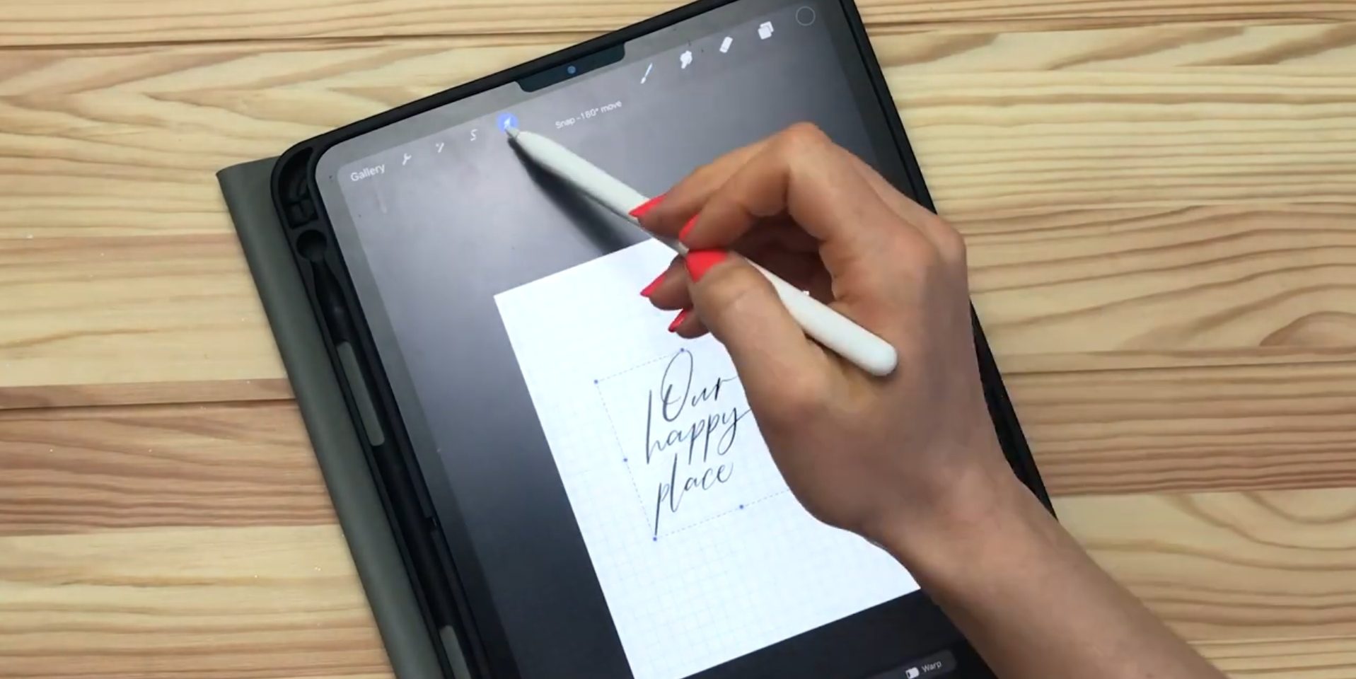Creating a calligraphy design on iPad using Procreate and Apple Pencil for foil printing