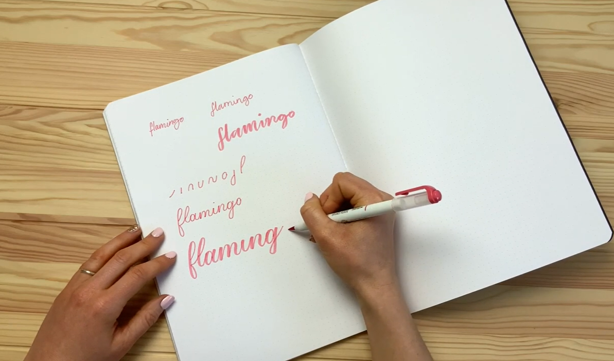 Brush pen calligraphy showing thick downstrokes and thin upstrokes