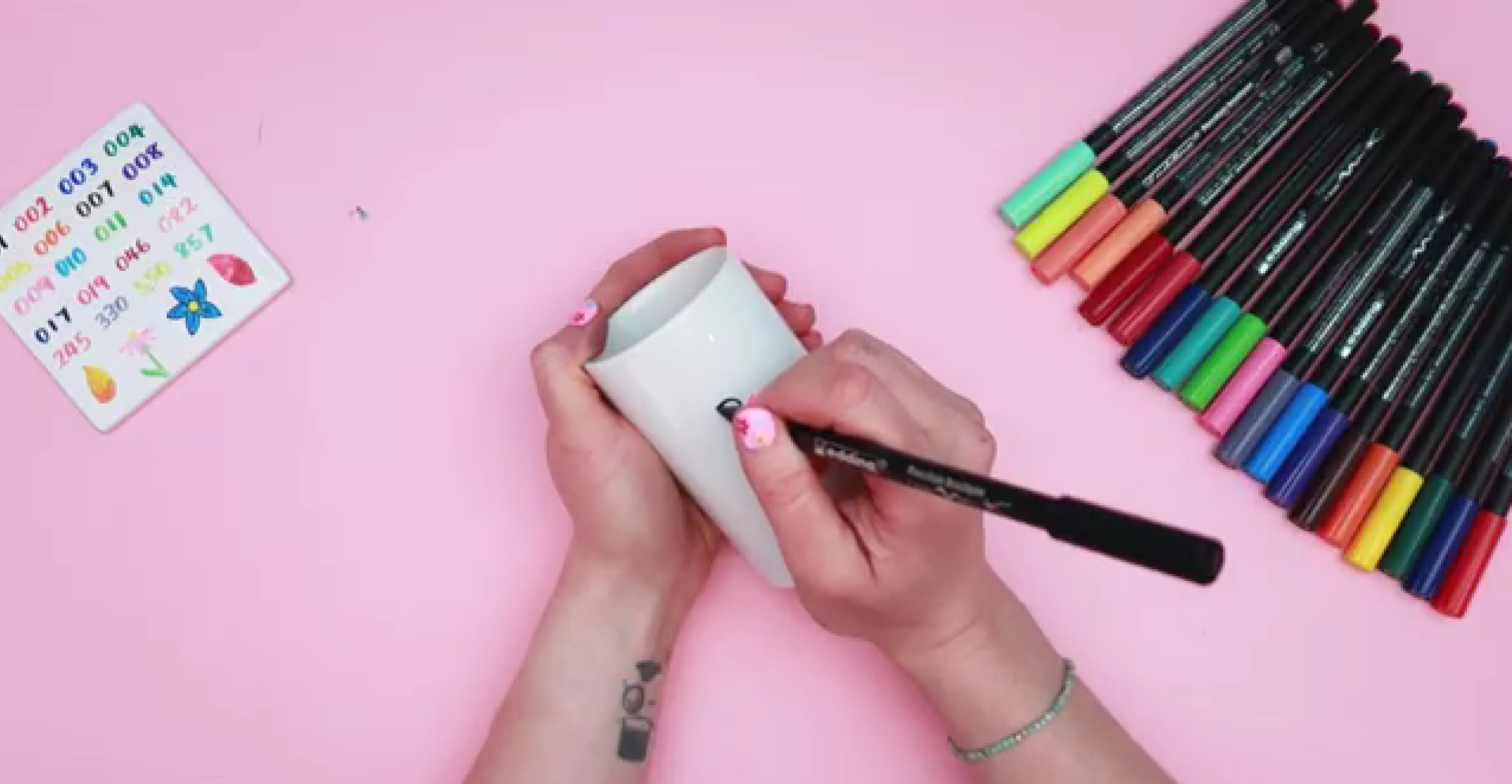 Plain white ceramic pen pot ready for hand lettering and floral decoration