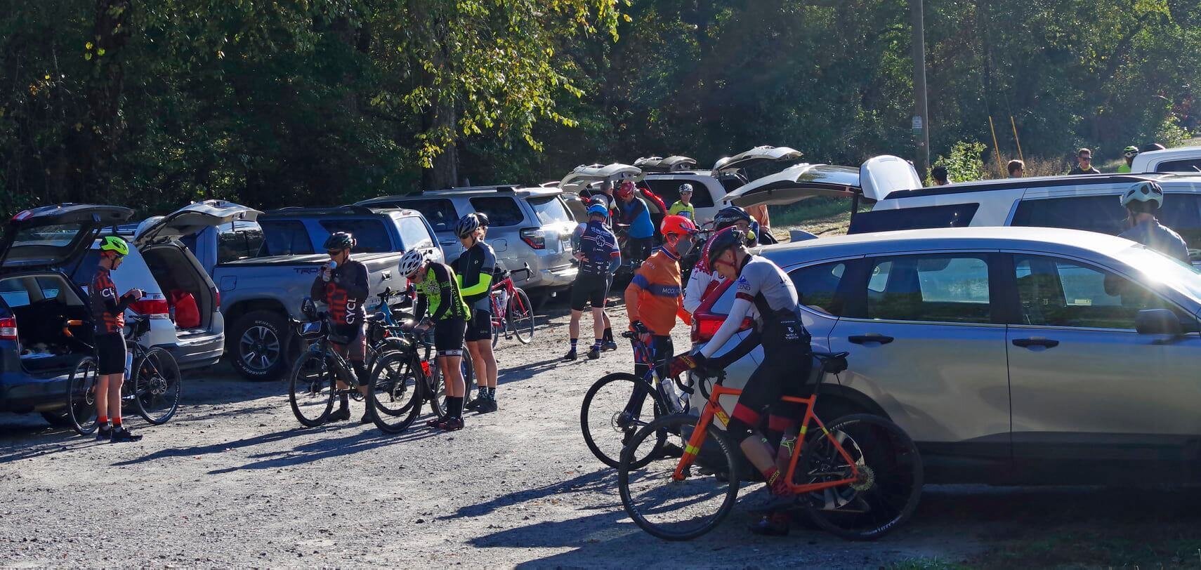 People checking computers, tire pressure and still talking about how they haven’t been riding much. Photo Credit: Patty Hall Young