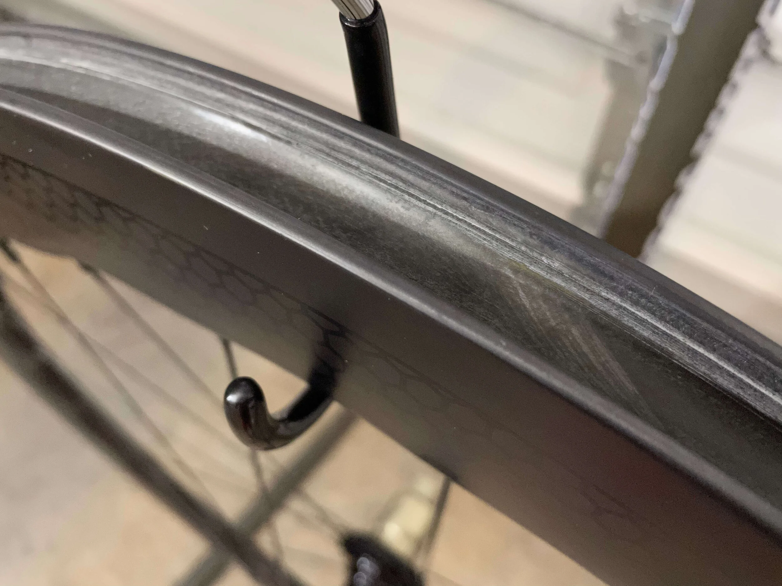Clean surface with no spoke holes.  No need to worry about rim tape peeling back and causing the air to leak out.