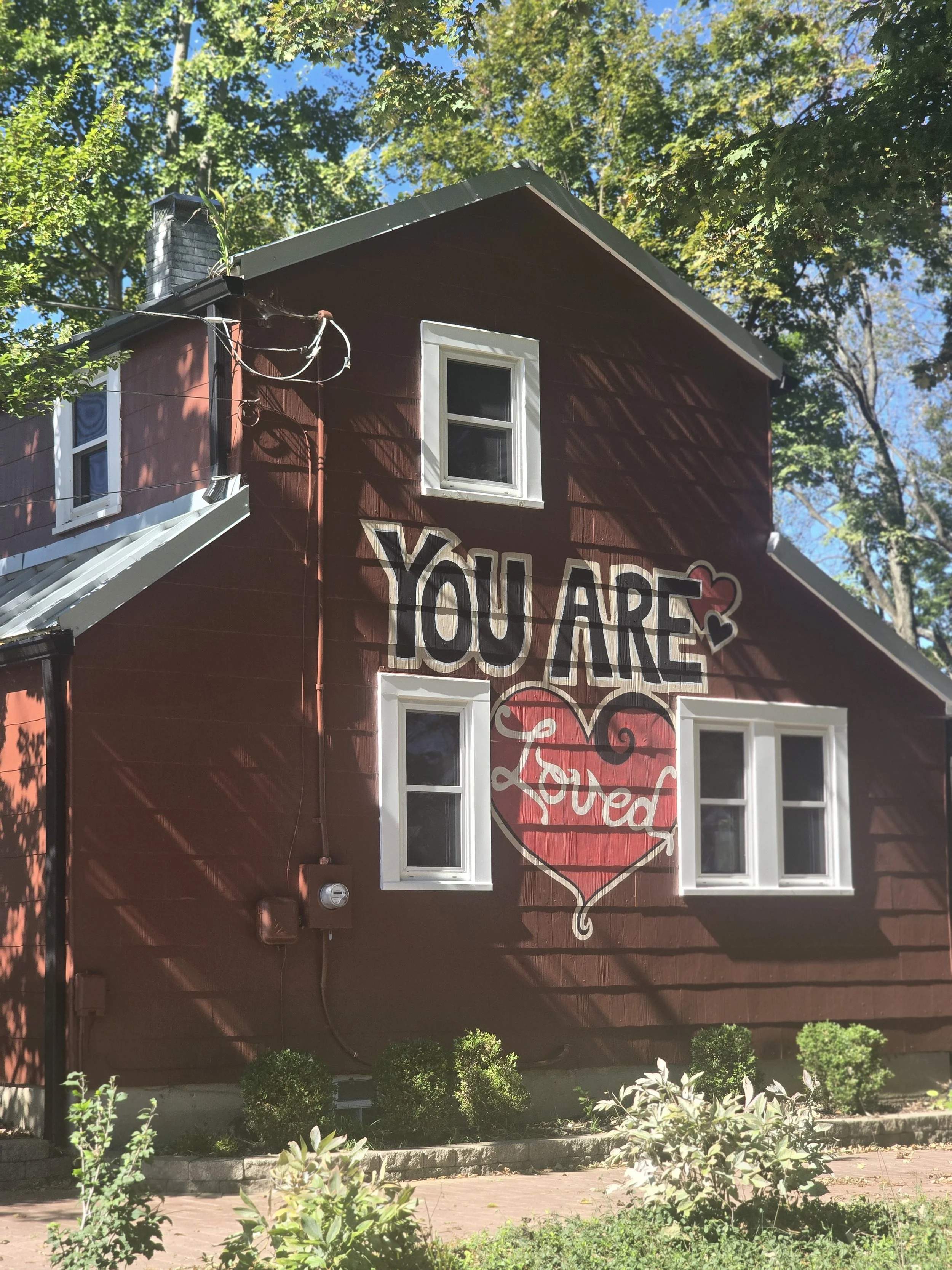 A mural to remind us all that we are loved. Home located in Yellow Springs, Ohio.