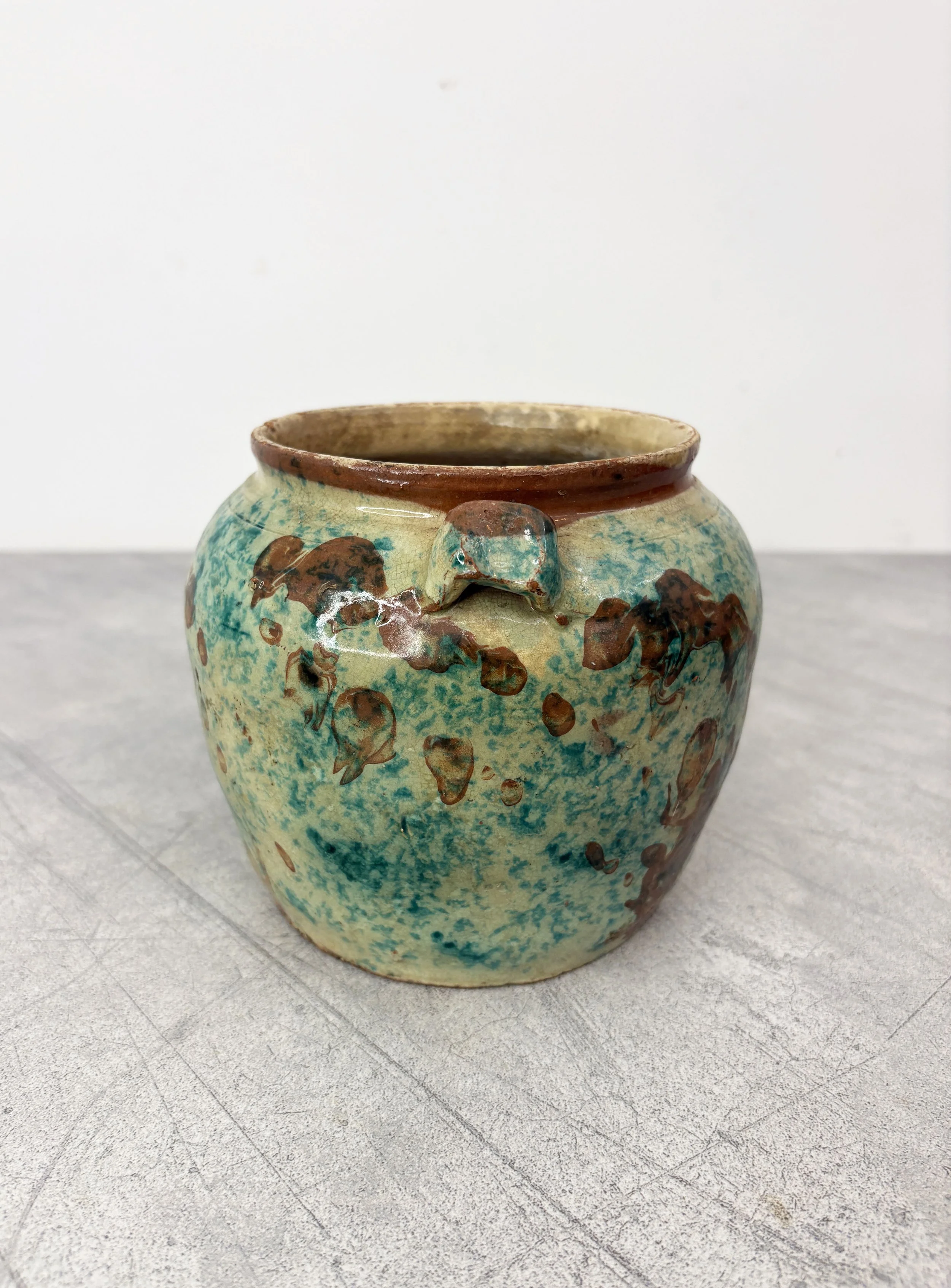 Italian green speckled glaze pot