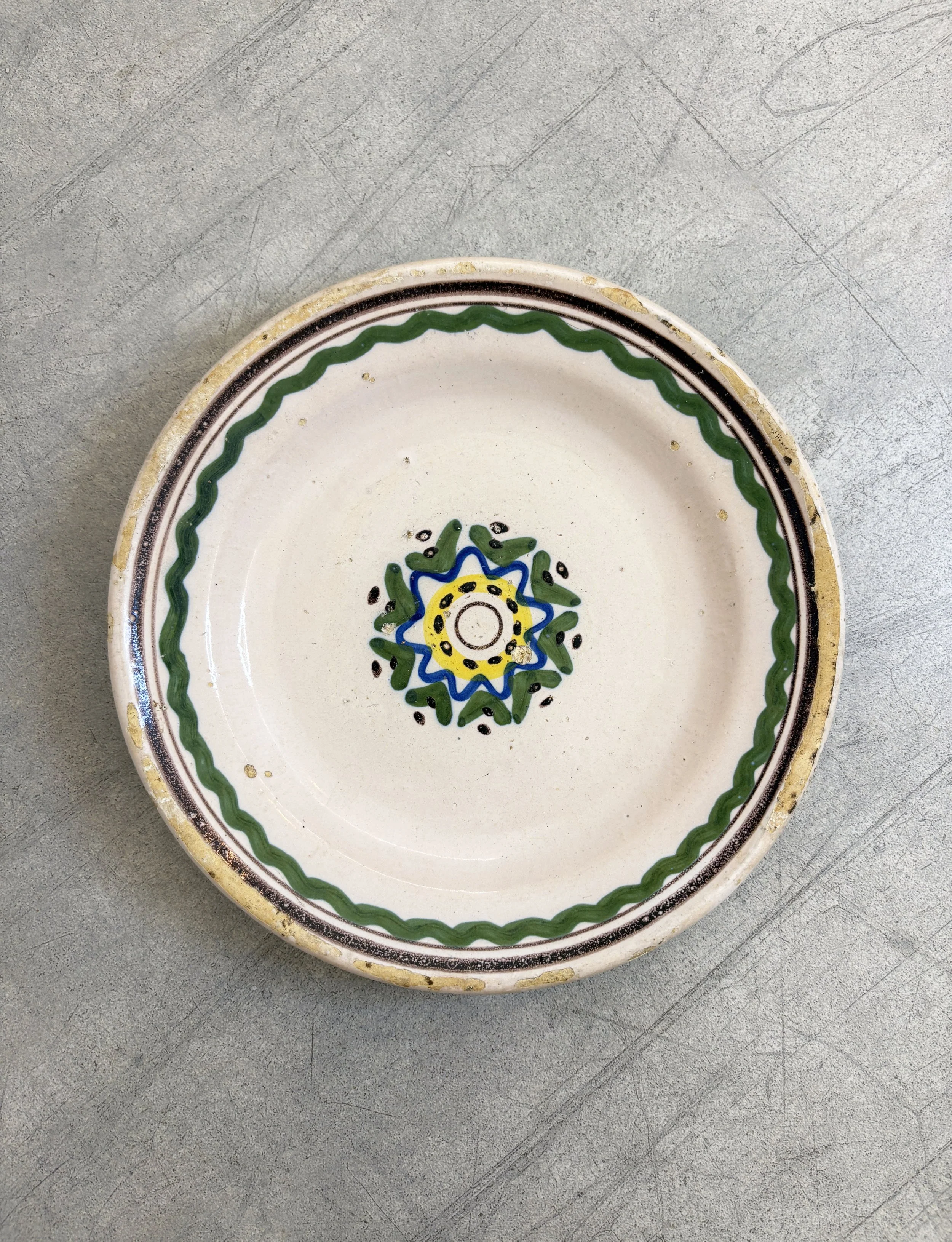 small antique Italian plate with star motif