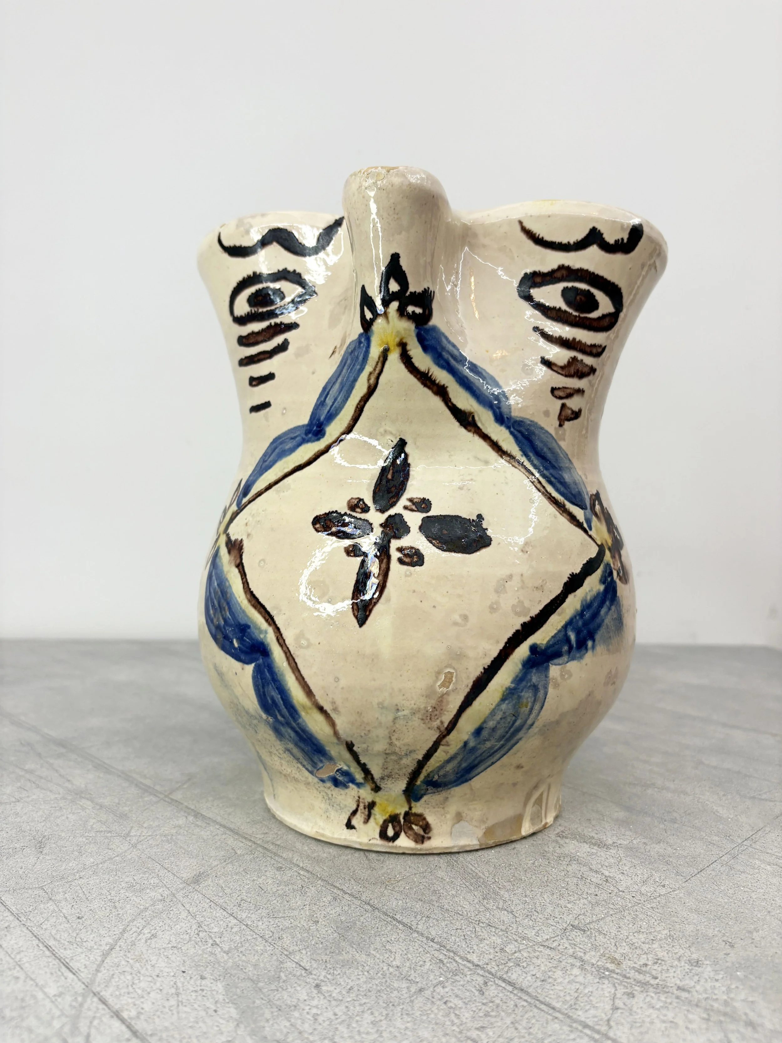 hand painted evil eye pitcher Puglia