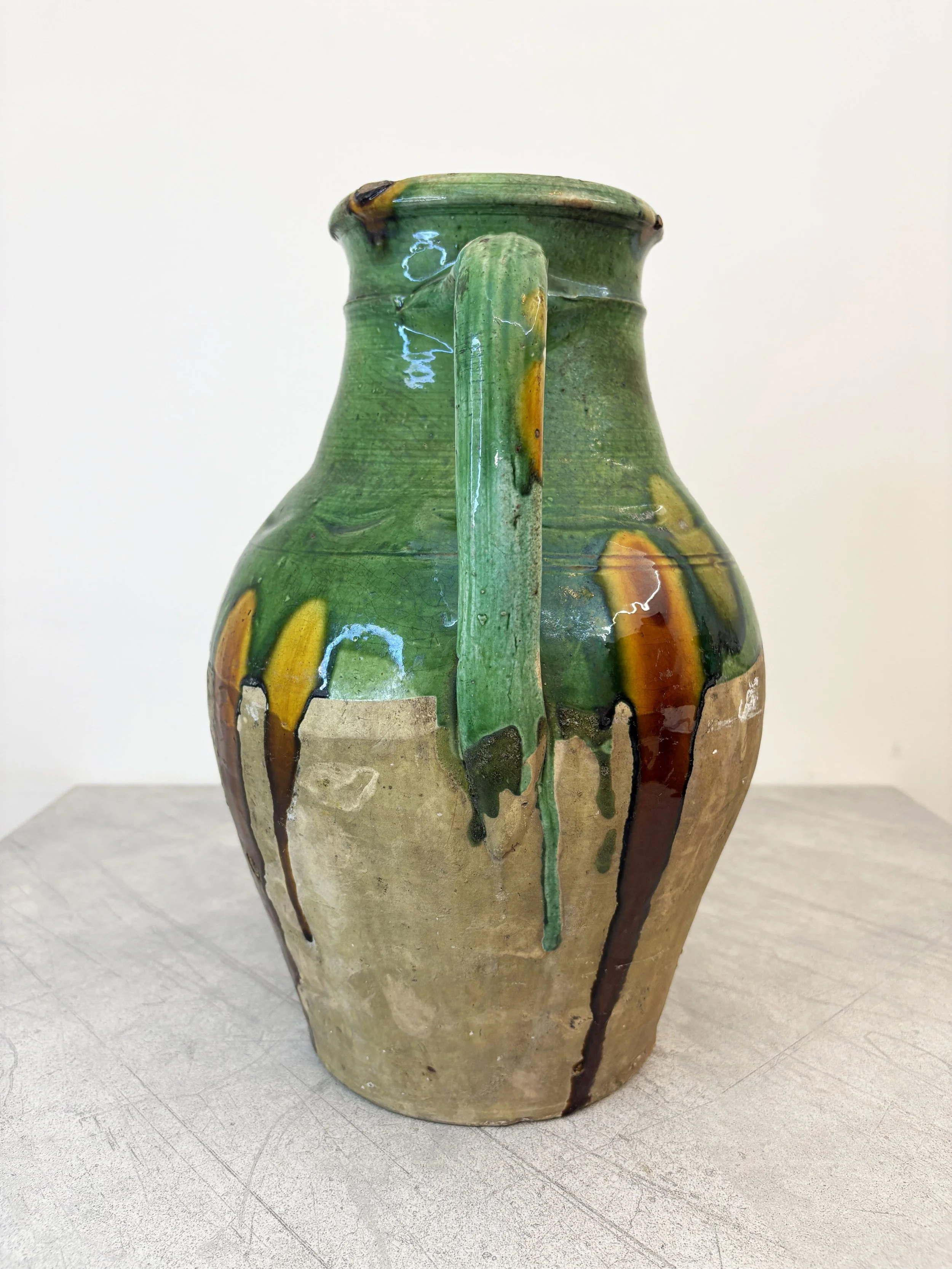 antique Italian green pot with drip glaze