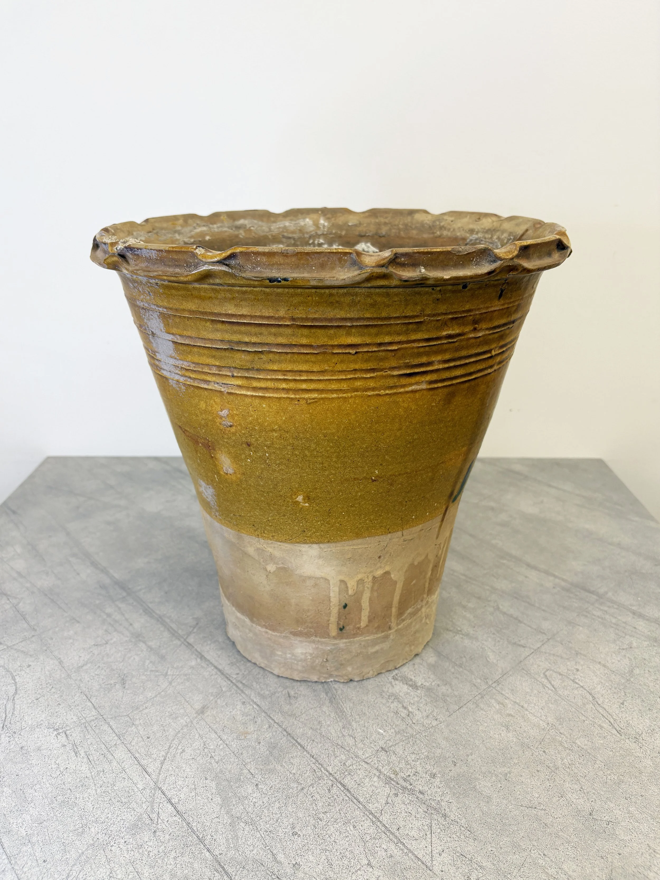 yellow glazed plant pot