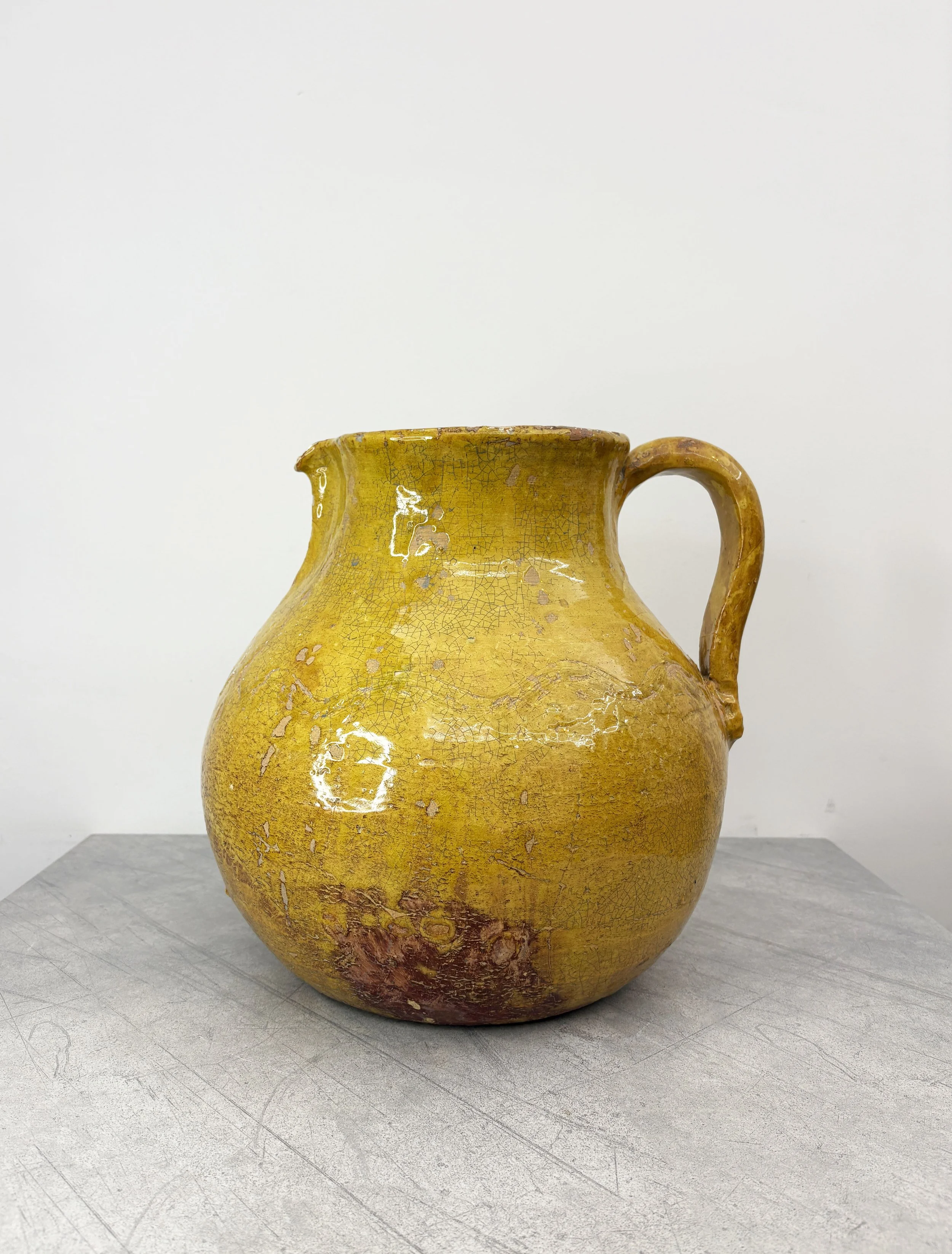 large antique Italian yellow pitcher