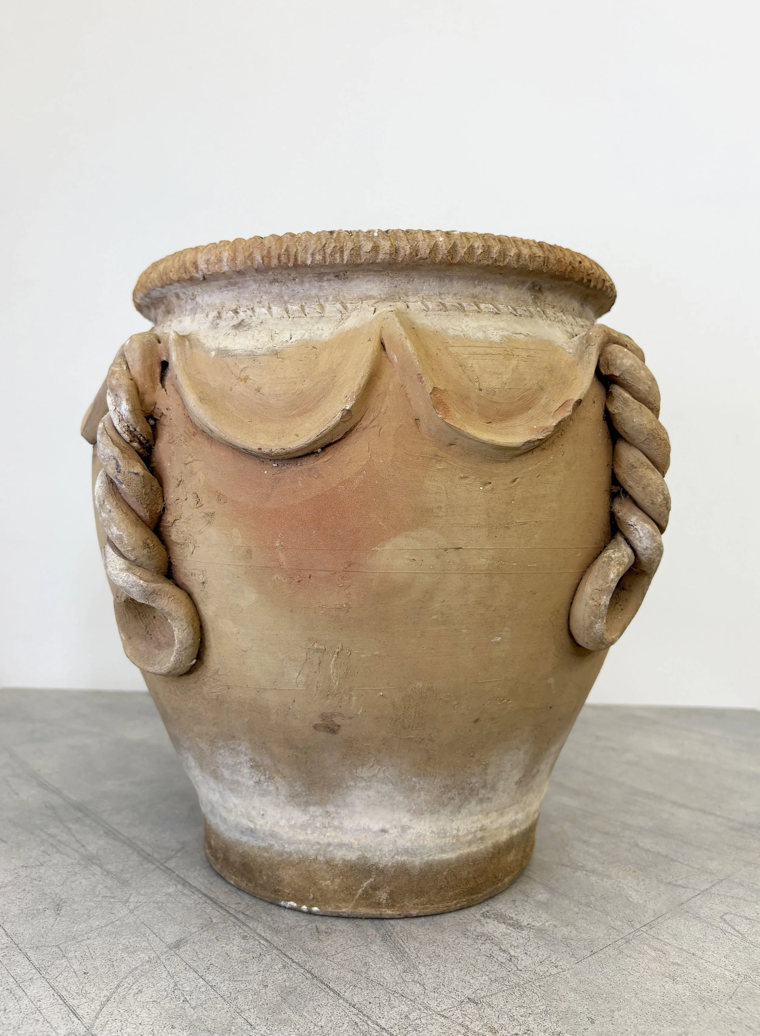 old plant pot with decorative design