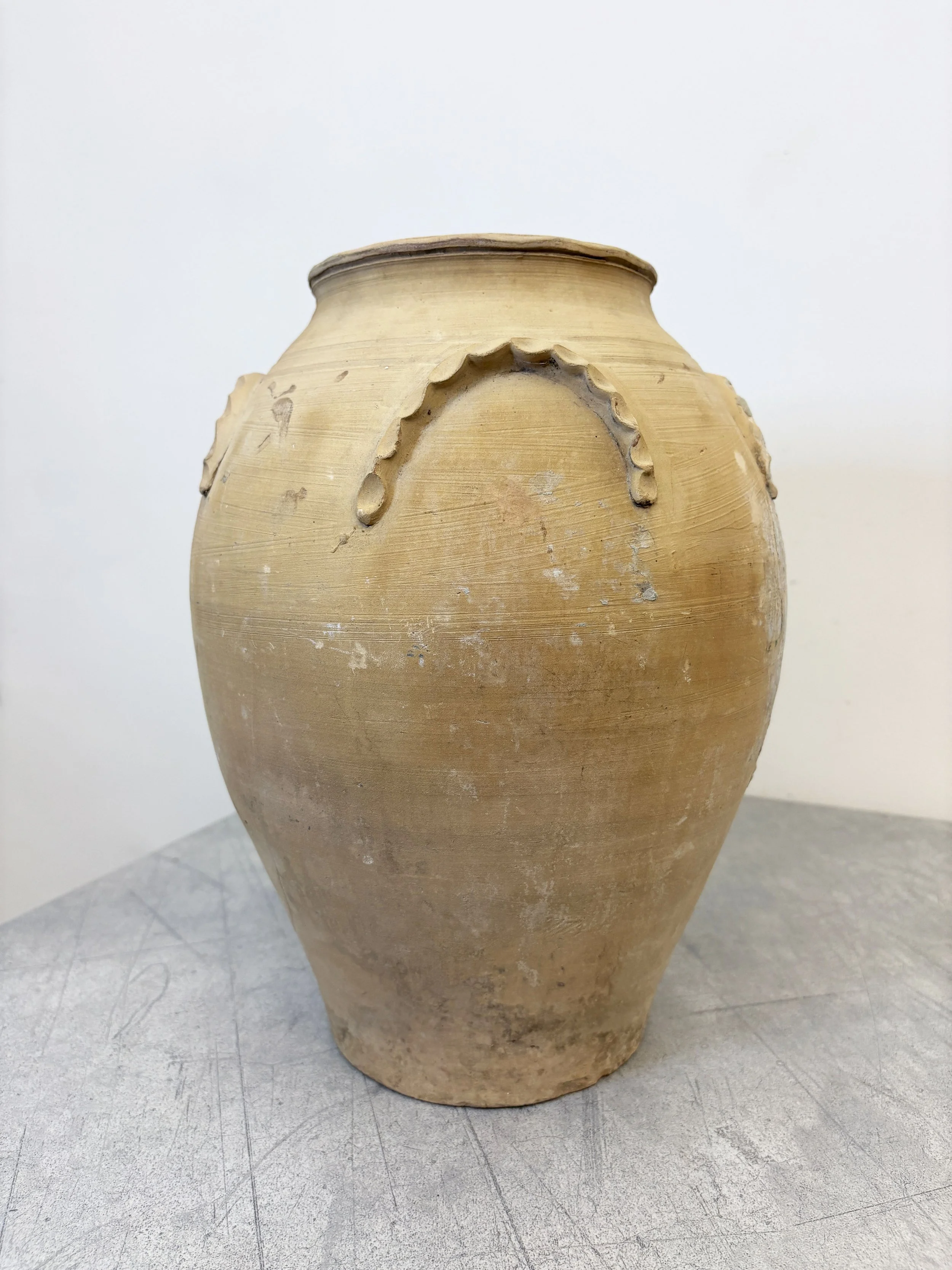 antique unglazed ceramic vase