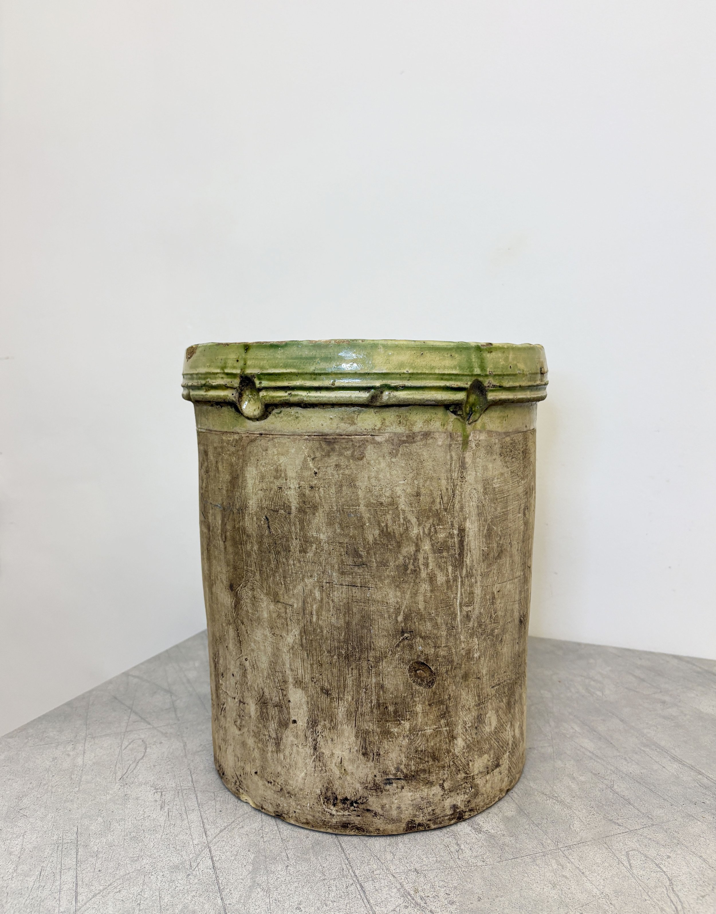rustic ceramic plant pot with green glaze Puglia