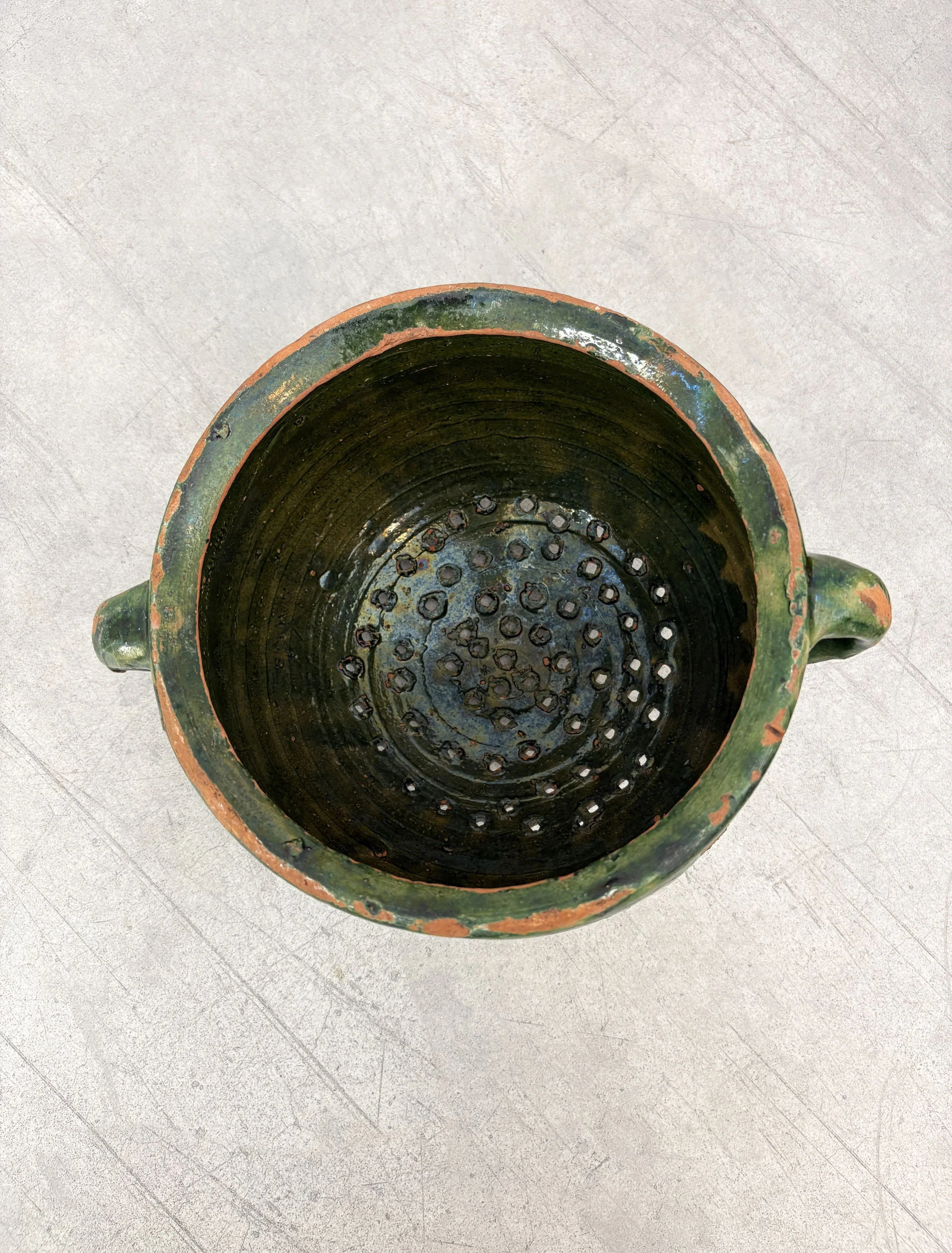 antique rustic green colander Puglia