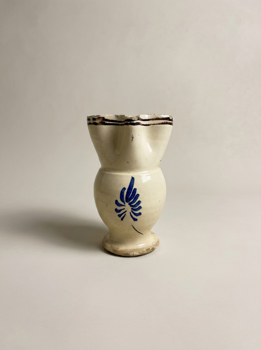 antique Italian jug with hand painted blue flower