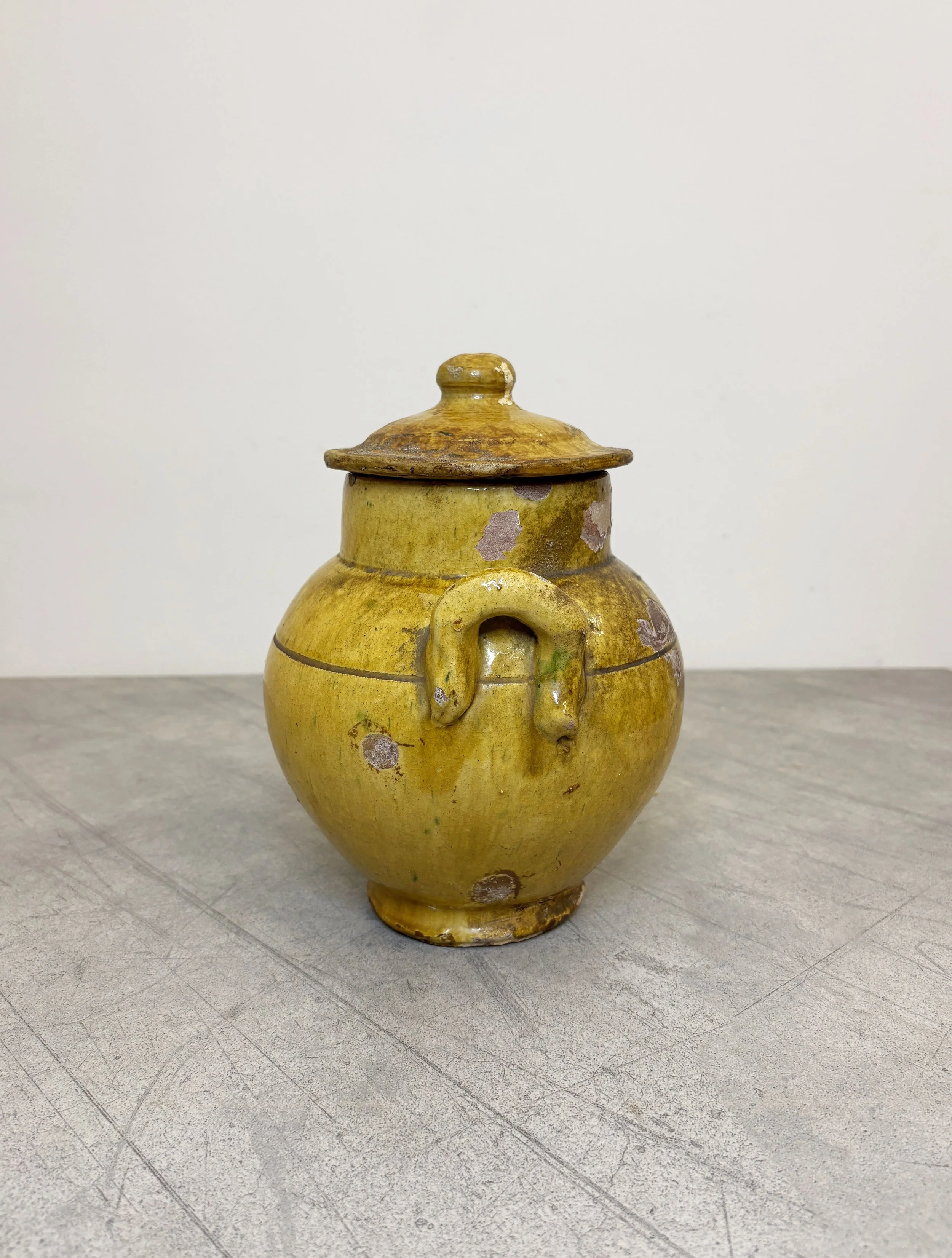 yellow glazed pot with lid